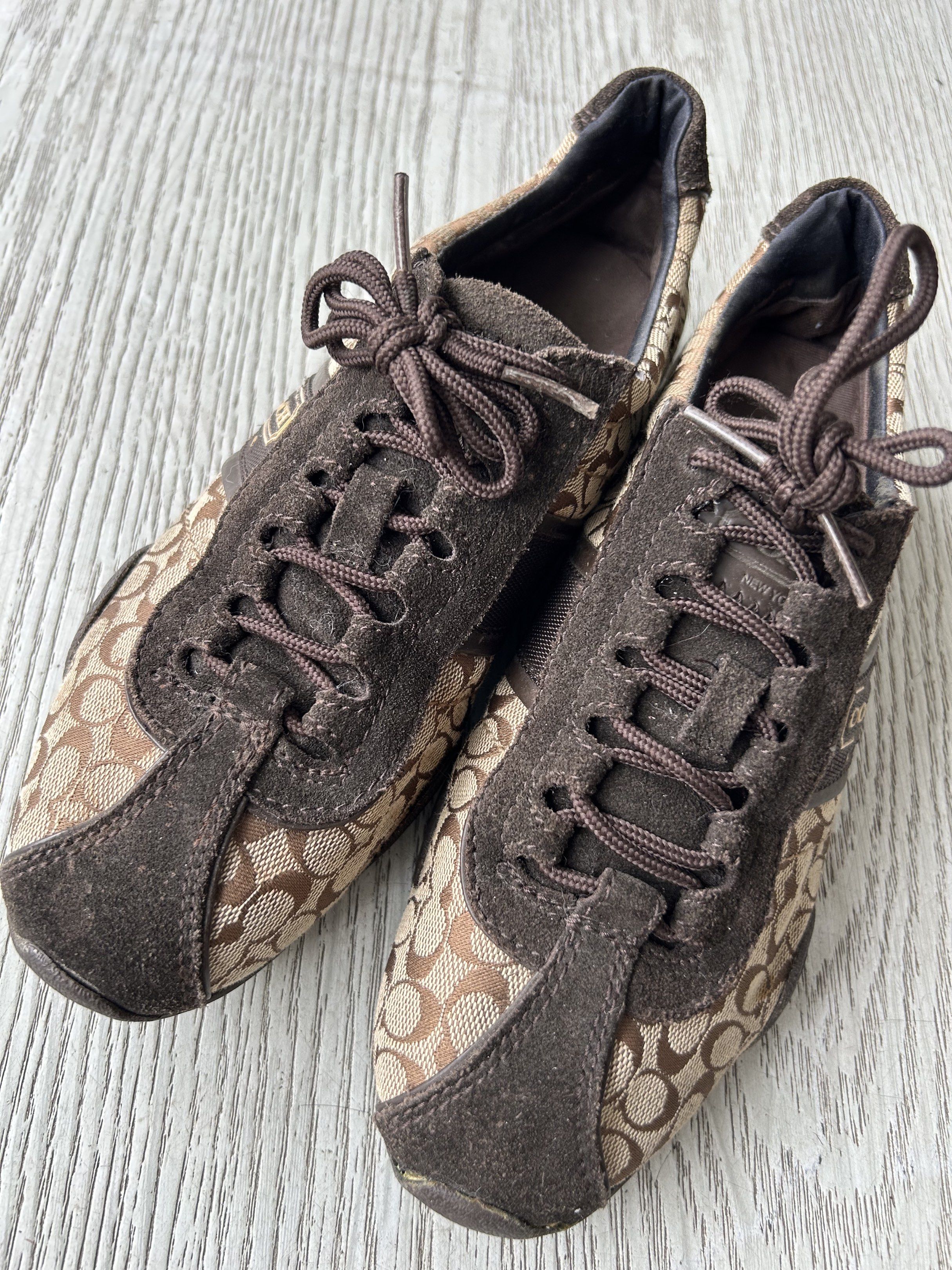 Coach Rosalita Sneakers (Category: Sneakers) located in Roxas City. Submitted by rglnos (Listing ID 1420667448, Image 2). Description: - Authentic Coach Rosalita sneakers - Classic brown Coach monogram pattern - Suede toe and tongue - Brown laces - Size: 7.5M - Made in China - Soles show wear.