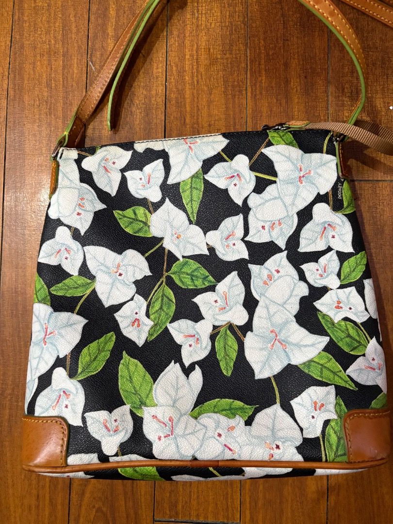 Dooney & Bourke Shoulder/ Body Bag (Category: Luxury Bags & Wallets) located in Pasig City. Submitted by lbckdavid (Listing ID 1420582931, Image 2). Description: Dooney & Bourke body bag in floral design With some flaws or stains in the leather materials H: 26cm L: 26cm W: 9.5 cm Needs cleaning Bought with Reg. Card but unfortunately mixed up with other reg. card. Do not know which one is which. No dust bag Decluttering.