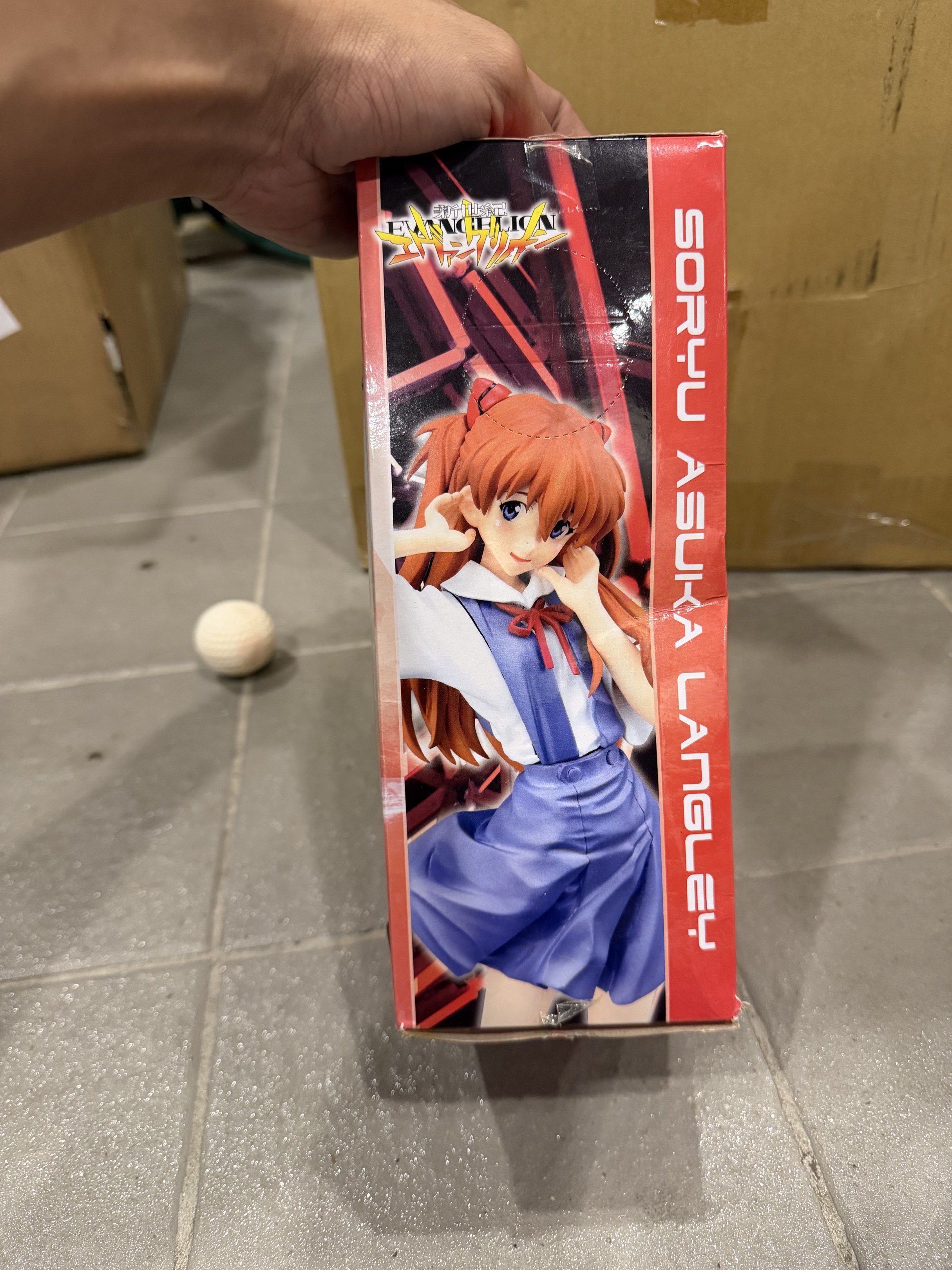 Evangelion Asuka Langley Figure (Category: Figurines & Statues) located in Makati City. Submitted by japankycollection (Listing ID 1420582031, Image 2). Description: - Evangelion Asuka Langley figure - Premium figure - Brand new, in original packaging - Features Asuka in school uniform - Box has Japanese text.