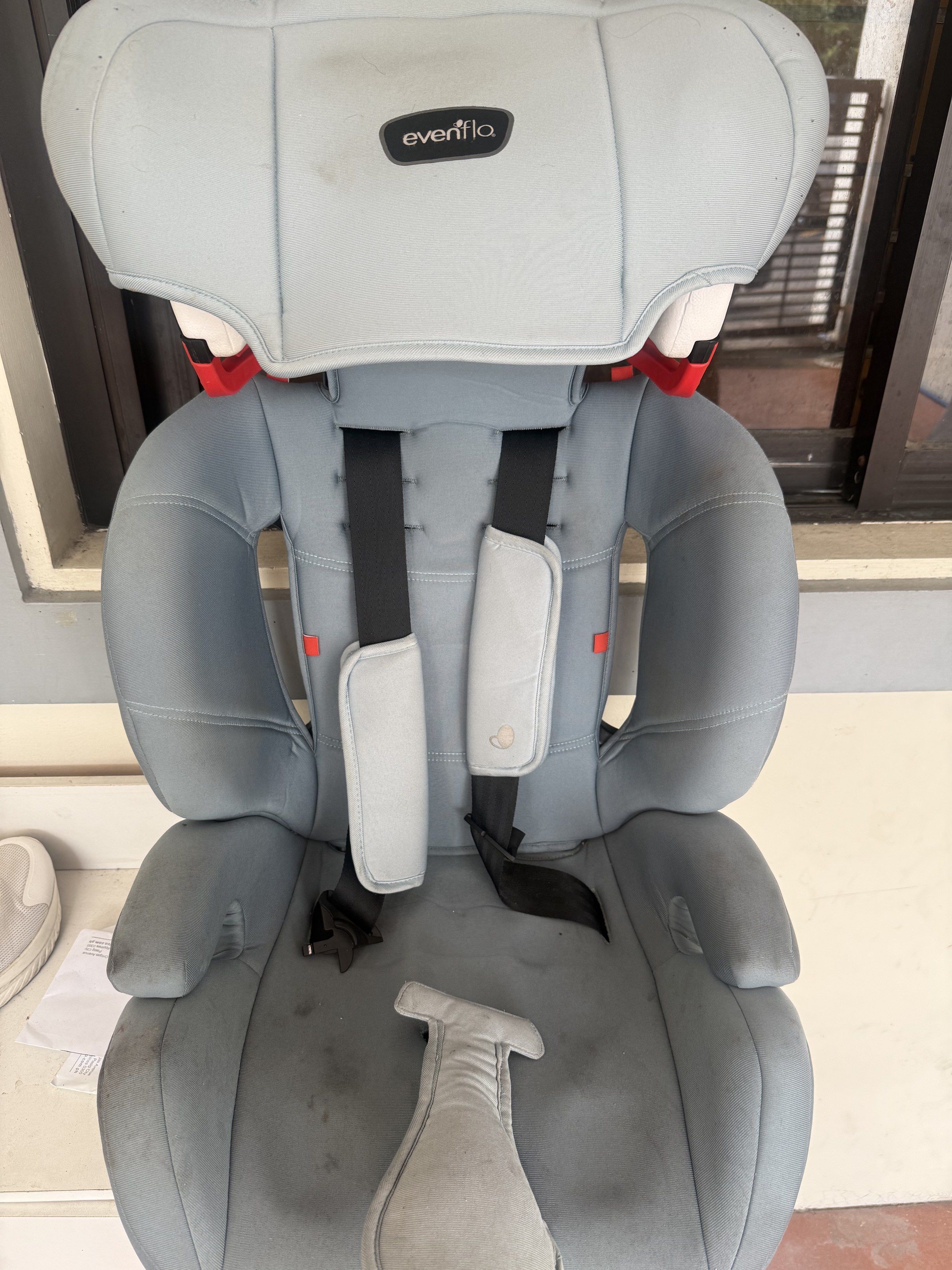 Evenflo Car Seat (Category: Car Seats) located in Manila. Submitted by ellematubis (Listing ID 1420606166, Image 2). Description: - Evenflo car seat - Adjustable headrest and harness - Gray fabric - Padded armrests and seat - Includes harness pads - Shows some stains and wear - Suitable for children within specified weight and height limits - This was used by my son until 7yo.