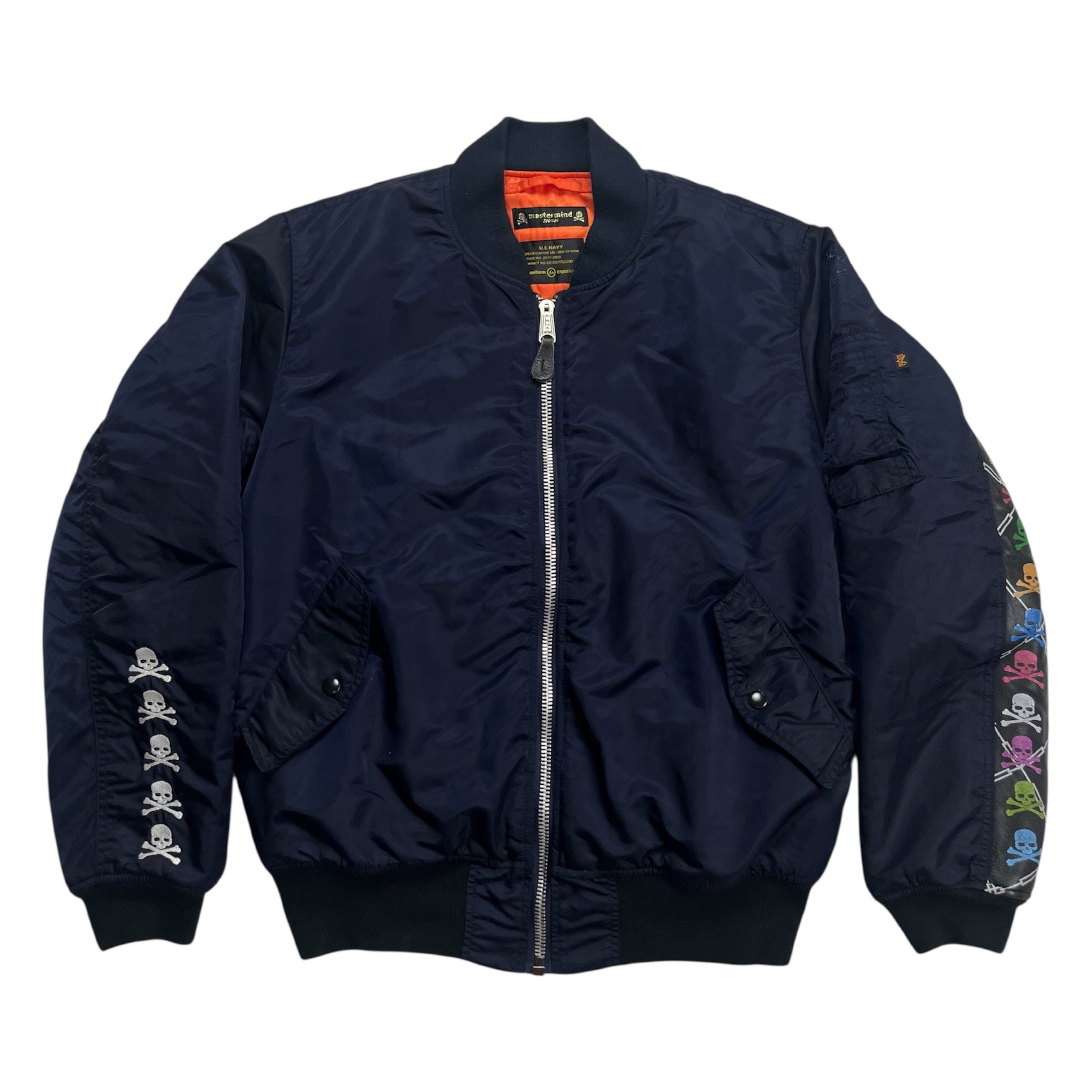 FW 2013 Mastermind x Uniform Experiment ‘Skull and Bones’ Bomber Jacket (Category: Coats, Jackets and Outerwear) located in Quezon City. Submitted by jusjawnz (Listing ID 1420575795, Image 1). Description: From FW 2013, this Mastermind x Uniform Experiment “Skull and Bones” bomber jacket is cut in a traditional bomber silhouette and features embroidered Mastermind skulls running down the right sleeve, contrasted by leather trim adorned with skull