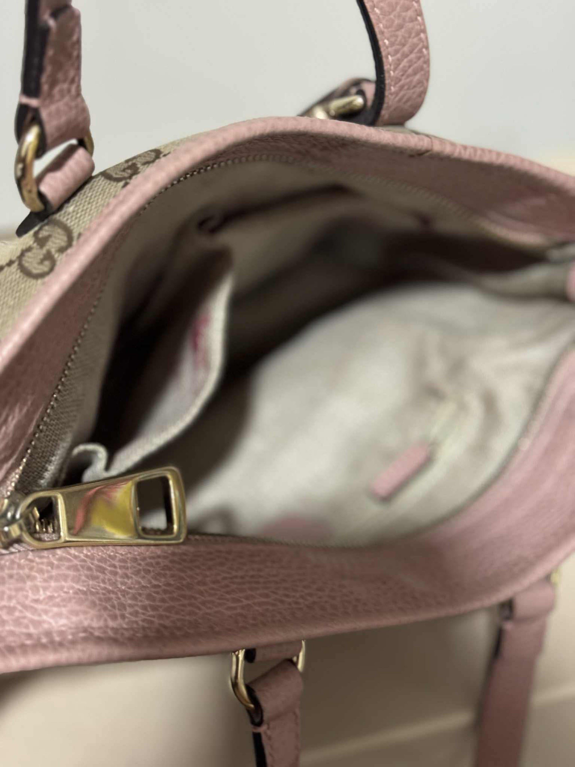 Gucci GG Canvas Pink Handbag (Category: Luxury Bags & Wallets) located in Batangas. Submitted by mjdel (Listing ID 1420742050, Image 2). Description: - Authentic Gucci handbag - Iconic GG canvas design - Pink leather accents - Top handle and detachable shoulder strap - Multiple interior compartments - Includes Gucci charm - Gold-toned hardware.