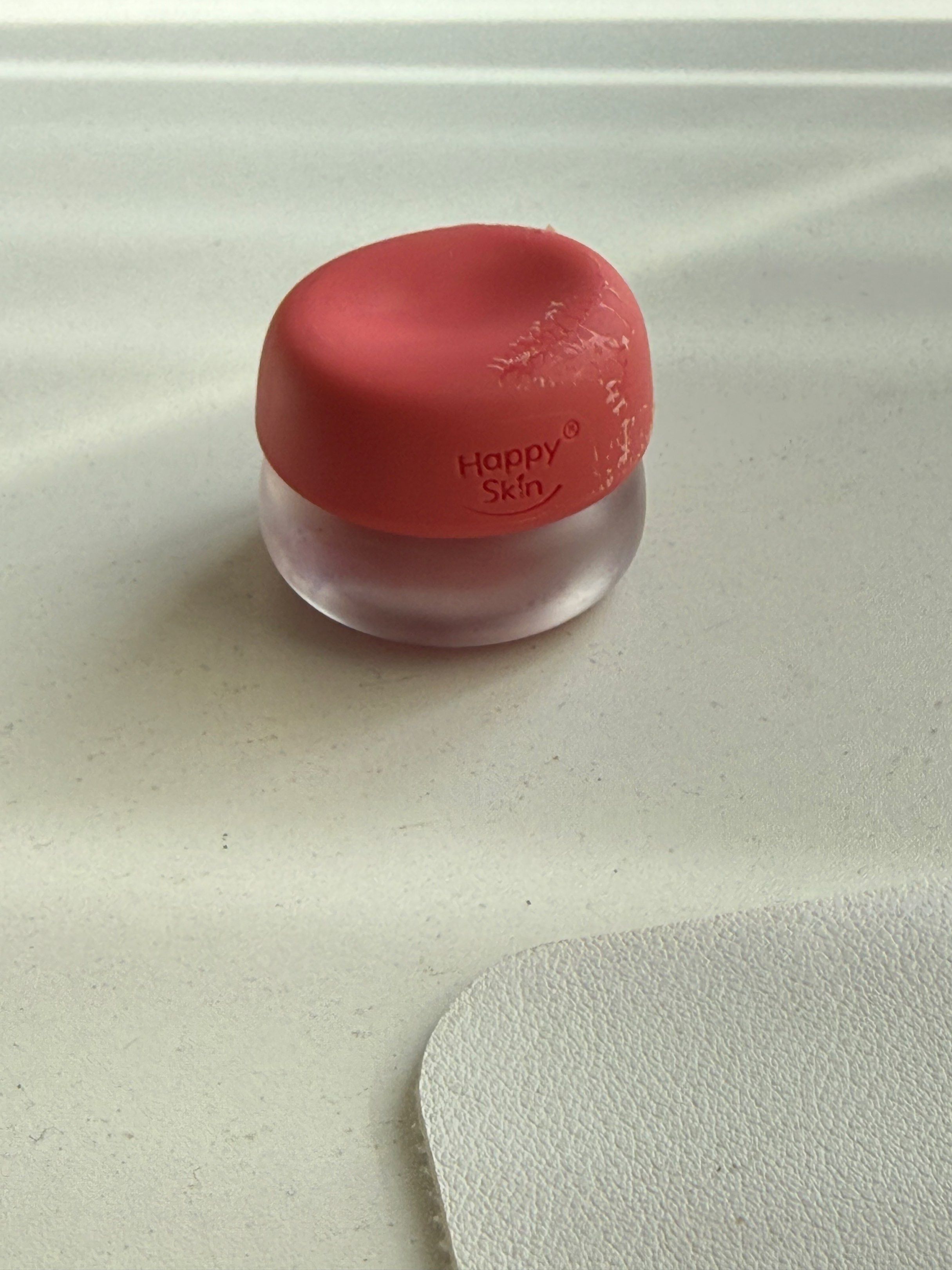 Happy Skin Mallow Pot Cherry Cloud Blush (Category: Makeup) located in Pasig City. Submitted by roadtominimalism09 (Listing ID 1420624801, Image 1). Description: - Happy Skin Mallow Pot blush in Cherry Cloud - Reddish-pink shade - 5g product in a clear jar - Red lid - Swatched on hand - Minor wear on lid, plastic is tearing.