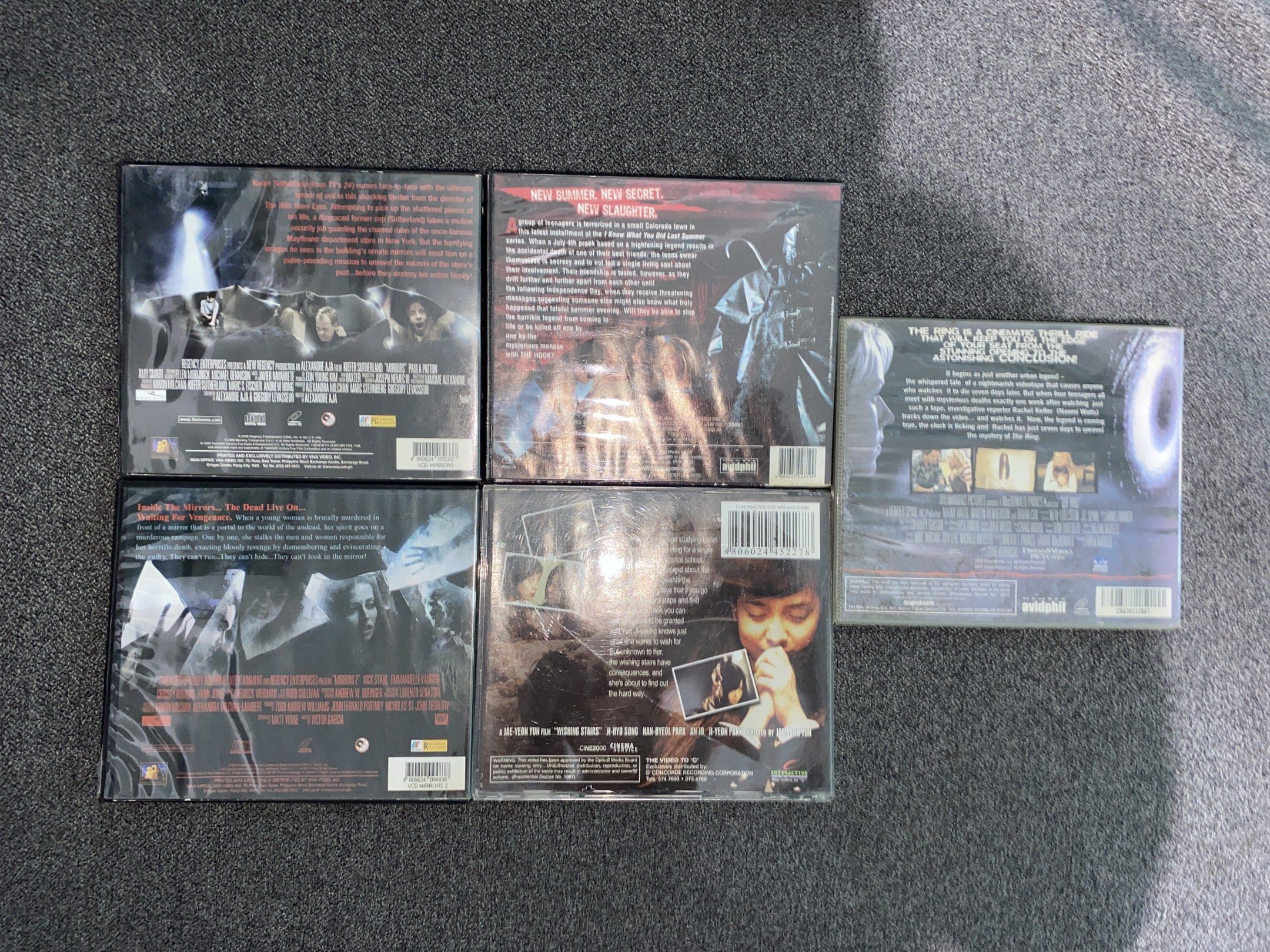 Horror Movie DVD Collection (Category: CDs & DVDs) located in Valenzuela. Submitted by lilychouchousether (Listing ID 1420666602, Image 3). Description: - Horror movie DVD collection. - Includes: "Mirrors", "Mirrors 2", "I'll Always Know What You Did Last Summer", "Wishing Stairs", and "The Ring". - All DVDs in original packaging. - Ideal for horror movie enthusiasts. PM FOR INQUIRY AND MORE PICTURES (BUY SHOULDERS SHIPPING FEE)‼️ SELLING STUFF F