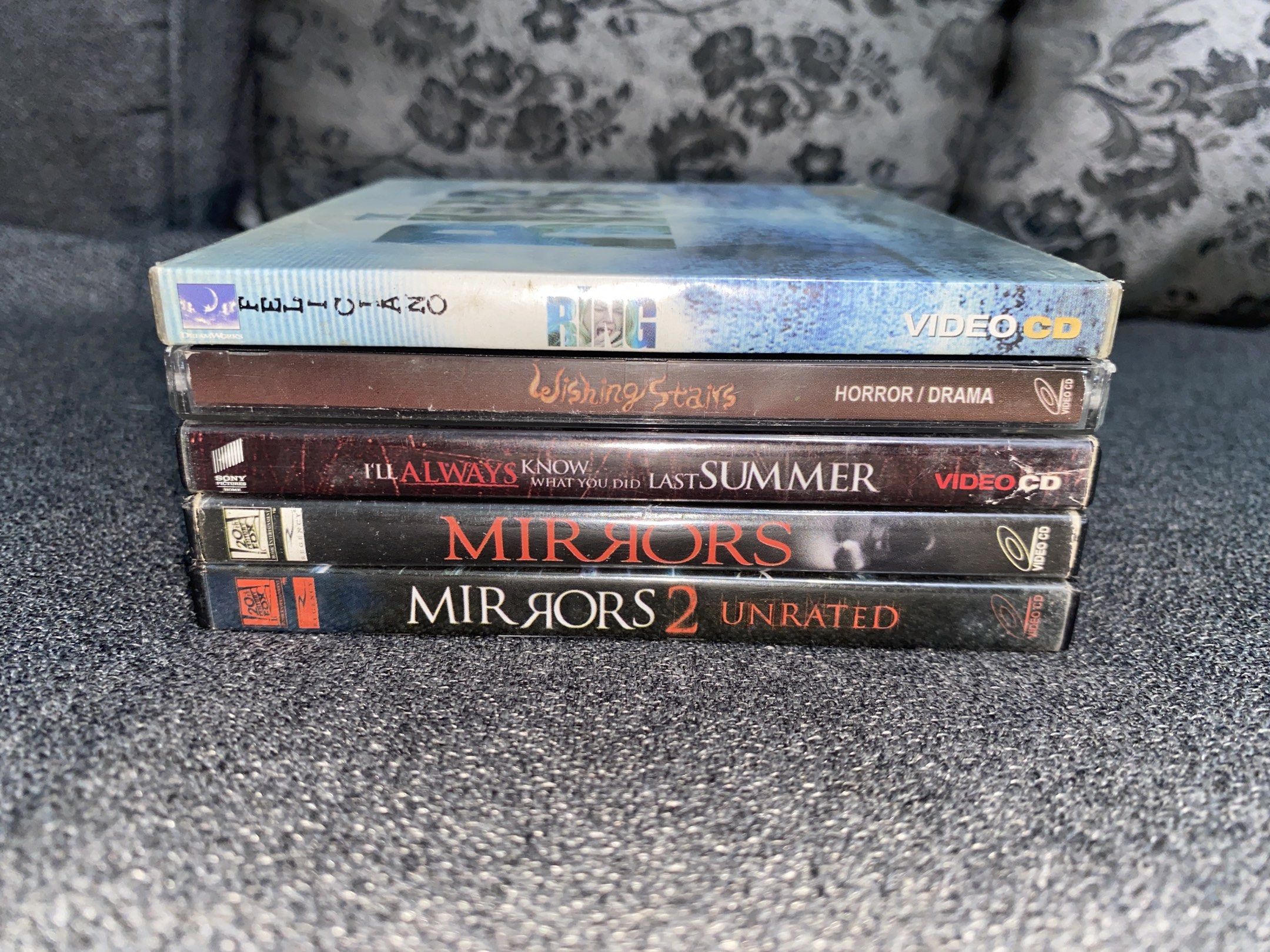 Horror Movie DVD Collection (Category: CDs & DVDs) located in Valenzuela. Submitted by lilychouchousether (Listing ID 1420666602, Image 2). Description: - Horror movie DVD collection. - Includes: "Mirrors", "Mirrors 2", "I'll Always Know What You Did Last Summer", "Wishing Stairs", and "The Ring". - All DVDs in original packaging. - Ideal for horror movie enthusiasts. PM FOR INQUIRY AND MORE PICTURES (BUY SHOULDERS SHIPPING FEE)‼️ SELLING STUFF F