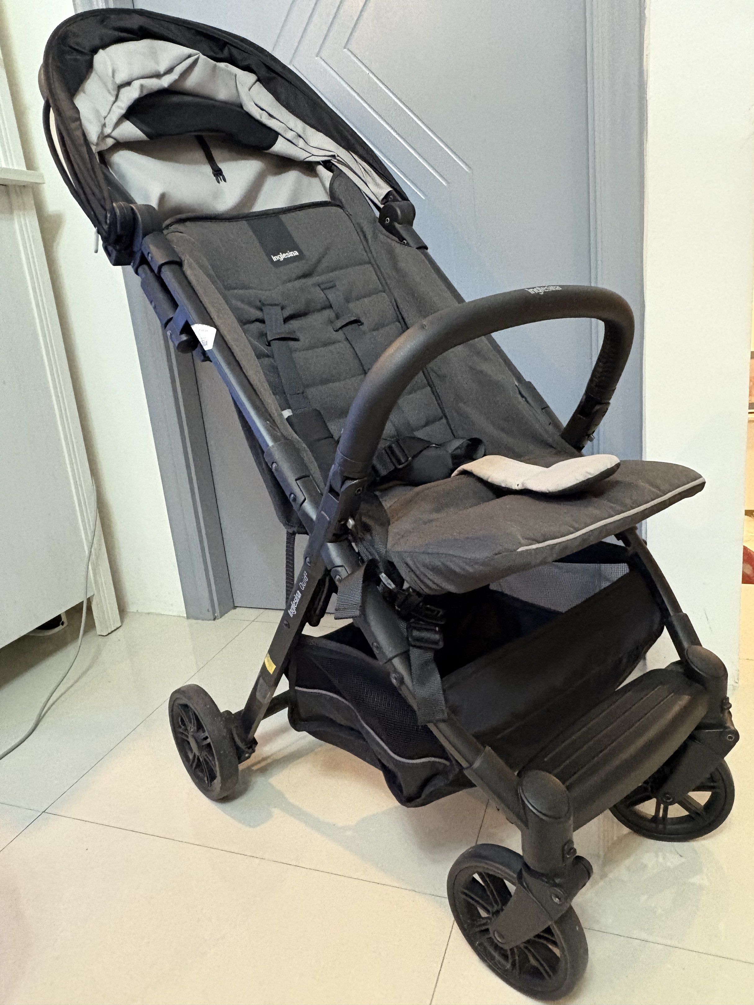 Inglesina Quid Stroller (Category: Strollers) located in Manila. Submitted by rob8819 (Listing ID 1420588436, Image 2). Description: - Inglesina Quid stroller - Used 2x in travel abroad - Punctured handle due to airport handling - Black frame and seat - Includes sun canopy - Features a storage basket - Folds for easy storage and transport.