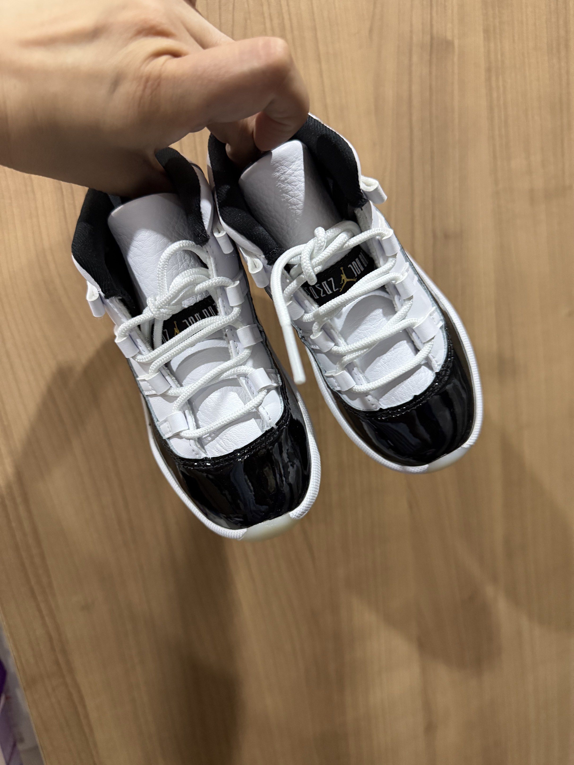 Jordan 11 Retro (TD) Black/White (Category: Babies & Kids Fashion) located in Quezon City. Submitted by cluttergoods (Listing ID 1420731427, Image 1). Description: Infant Jordan 11 Retro sneakers in black and white. Features a patent leather toe, white laces, and a black collar. The soles are translucent. Comes with the original box. Size is 9C..