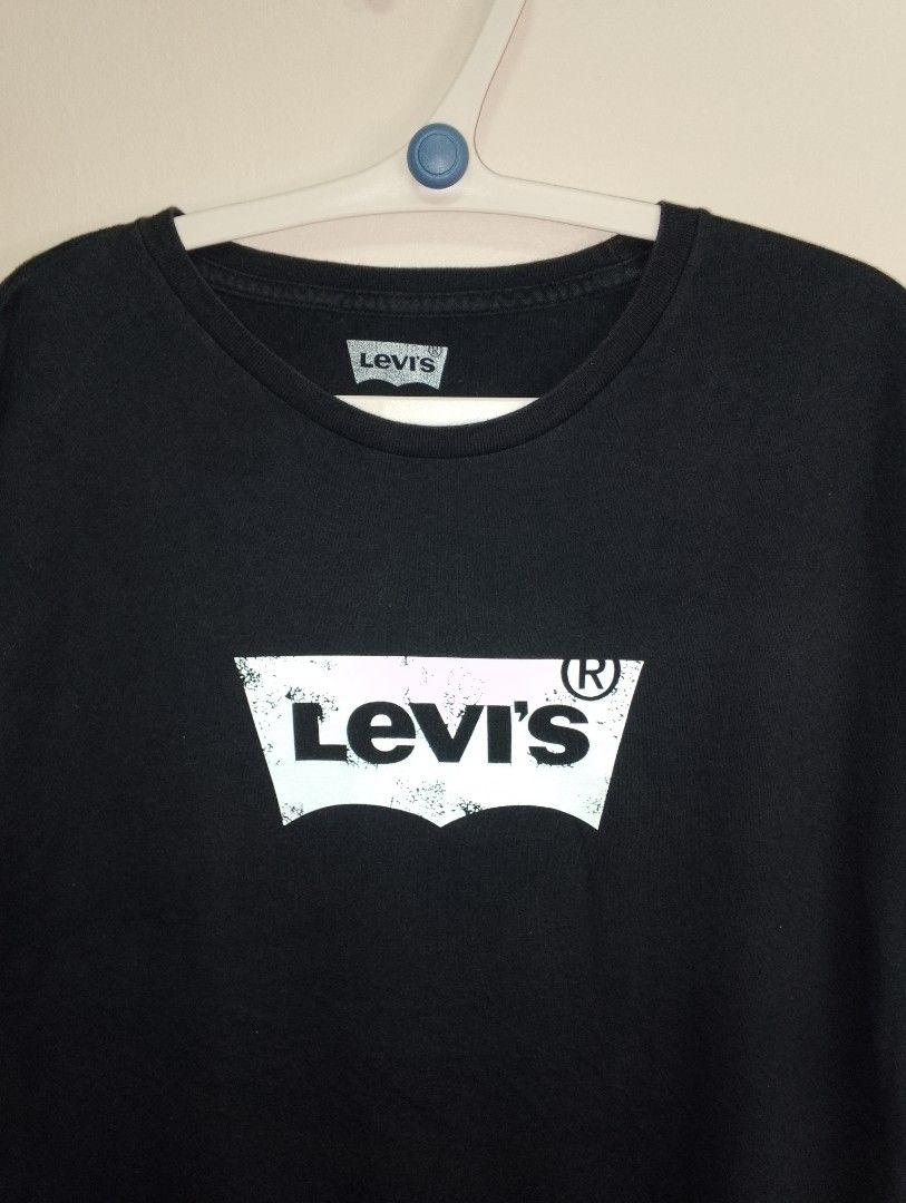 Levi's Black T-Shirt (Category: Tshirts & Polo Shirts ) located in Antipolo. Submitted by technothrift (Listing ID 1420629154, Image 1). Description: - Black Levi's t-shirt - Levi's logo on front - Standard fit - Authentic Levi's shirt - Large to Semi Xlarge (21x28.5) - Color Rate 8.5/10.