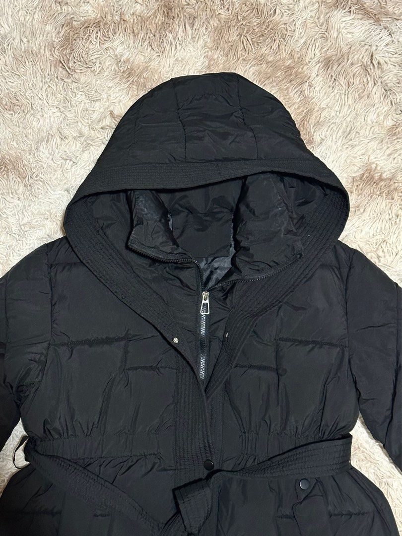 Long Black Puffer Coat (bought in Korea) (Category: Coats, Jackets and Outerwear) located in Paranaque City. Submitted by apcastillo (Listing ID 1420643509, Image 3). Description: Long Black Puffer Coat Personally bought this in Korea No flaws, in perfect condition Used once only Free size but fits S-L (it has zipper, buttons and a wrap around belt for snug fit) Measurements: - Arms length: 64cm - Arms width: 20cm - Coat Length: 97cm - Width: 57c