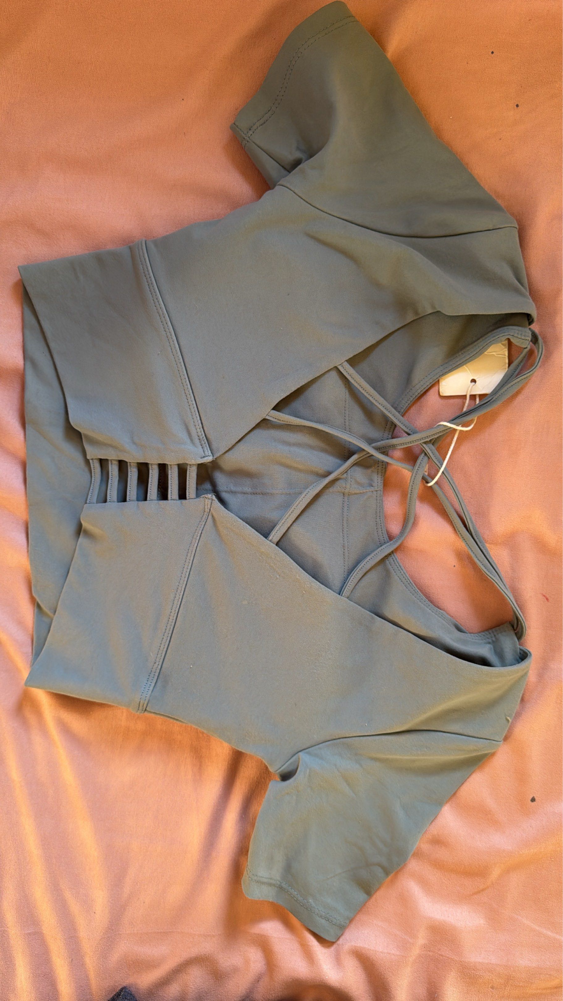 Lovito Criss-Cross Back Top (Category: Sleeveless) located in Silang. Submitted by declutter_cat (Listing ID 1420639865, Image 3). Description: Lovito Gym Top Brandnew Fits small to large RSF: decluttering Meet up: Around Dasma, Tagaytay, Silang MOP: Gcash & Bank .
