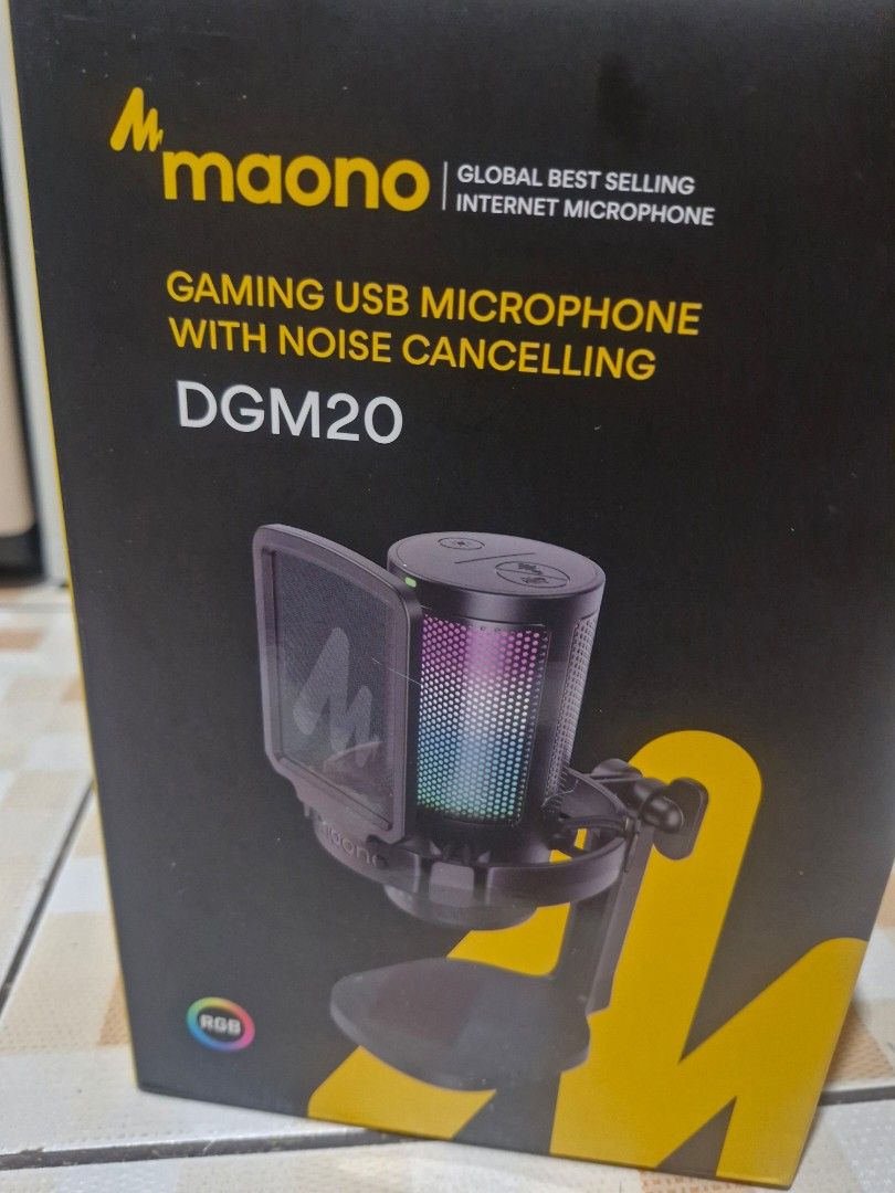 Maono DGM20 Gaming USB Microphone (Category: Microphones) located in Bacolod City. Submitted by racielle (Listing ID 1420636336, Image 1). Description: - Maono DGM20 USB Gaming Microphone - Noise cancelling - Controllable RGB lights - One-button mute - Includes shock mount and pop filter - Real-time monitoring - Adjustable gain - Accessories included - Made in China.