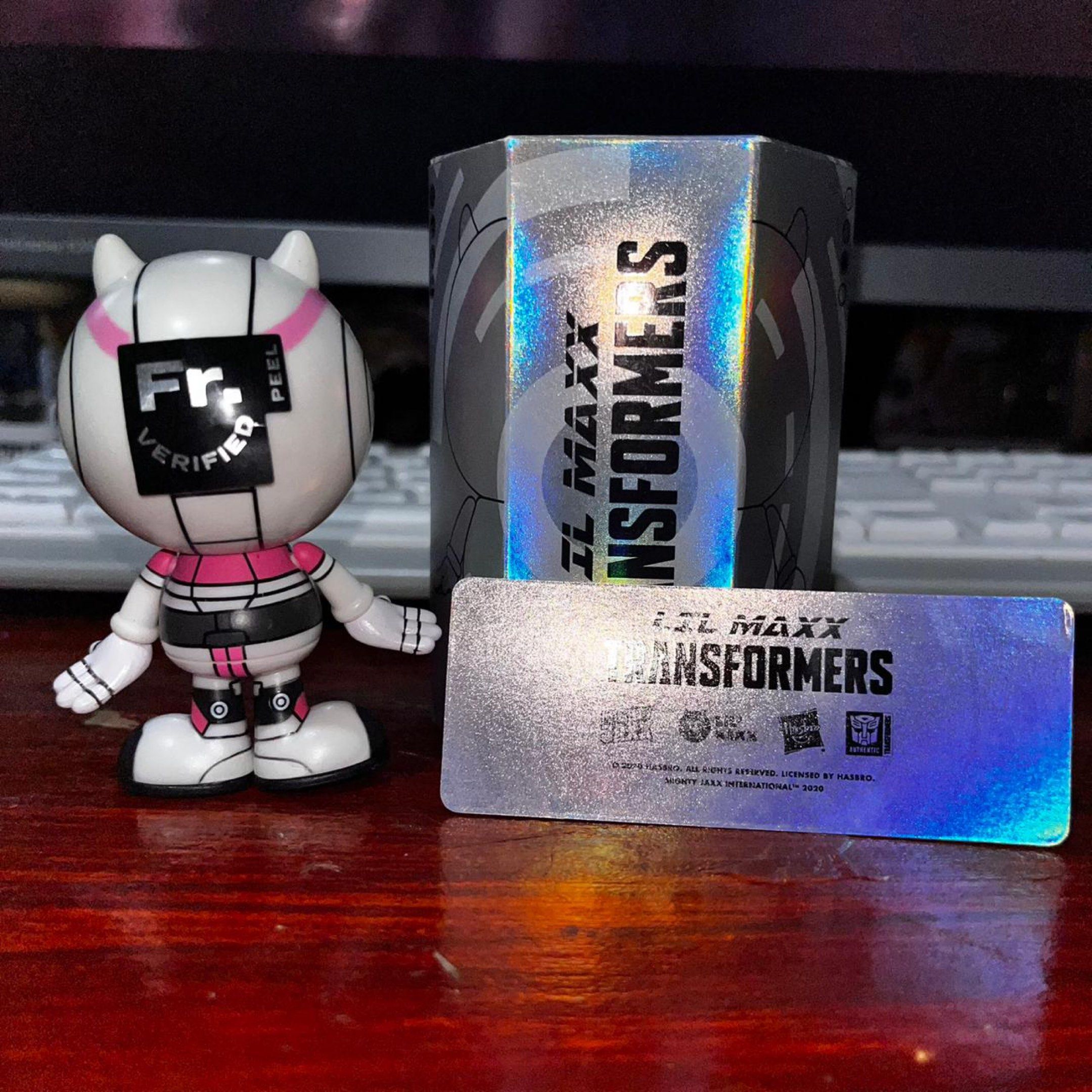 Mighty Jaxx Lil Maxx Transformers Arcee Figure (Category: Designer & Blind Box Toys) located in Del Monte. Submitted by collectandsell_ph (Listing ID 1420735662, Image 2). Description: - Lil Maxx Transformers Arcee figure - From a blind box series (packaging indicates rarity) - Includes original box - Includes collector's card - HELPING TAGS funko, pop mart, minis, anime, booktok, hotwheels, nendoroid, mighty jaxx, DC Comics, Marvel, Bandai, Toys