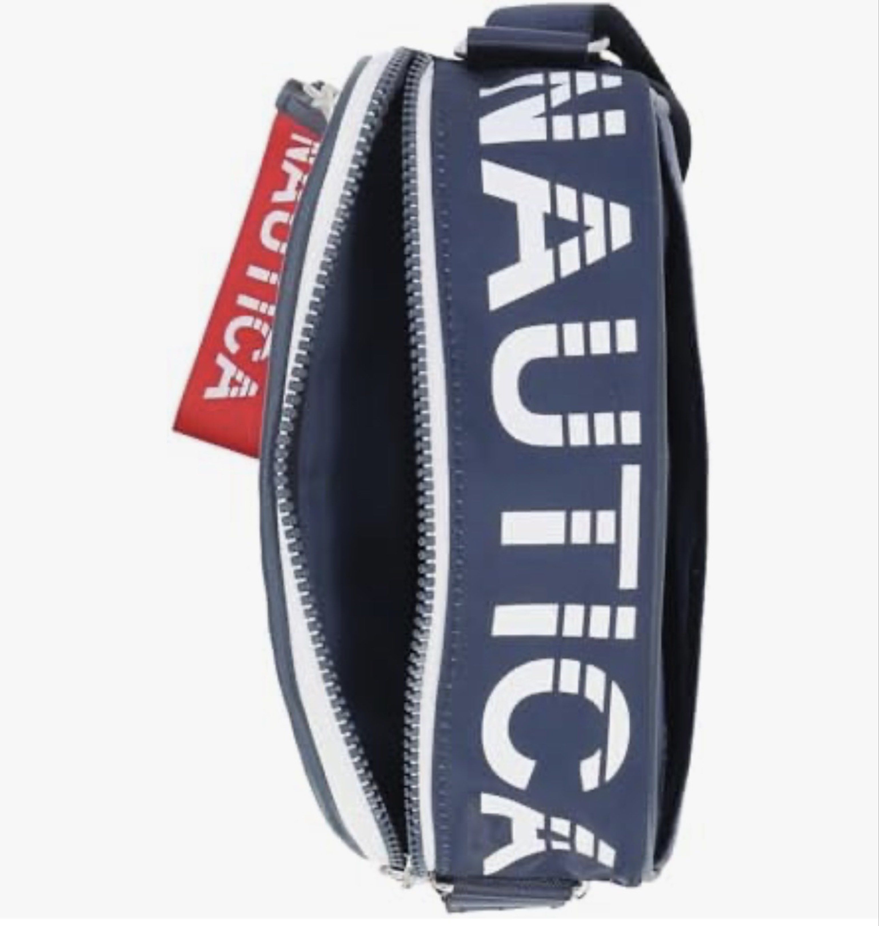 Nautica High Seas Crossbody Bag (Category: Cross-body Bags) located in Manila. Submitted by luxestuffph (Listing ID 1420600521, Image 3). Description: - Purchased in US - Brand new - On-hand PH - Navy and white color scheme - Main compartment - Adjustable shoulder strap - Zipper closure - Red Nautica tag - Compact and stylish design Material composition PU leather -Care instructions Hand wash only, Avoid machine wash, Do not iron, Store in a cool