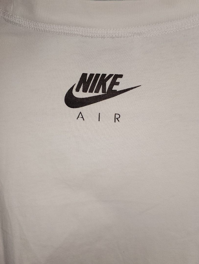 Nike Air White T-shirt (Category: Tshirts & Polo Shirts ) located in Antipolo. Submitted by technothrift (Listing ID 1420624766, Image 3). Description: - White Nike Air T-shirt - Features Nike Air logo on the front - Nike logo also printed on the back of the neck - Comfortable fabric - Perfect for everyday wear - Minimal Stain (Washable) - Large on Tag (21x25).