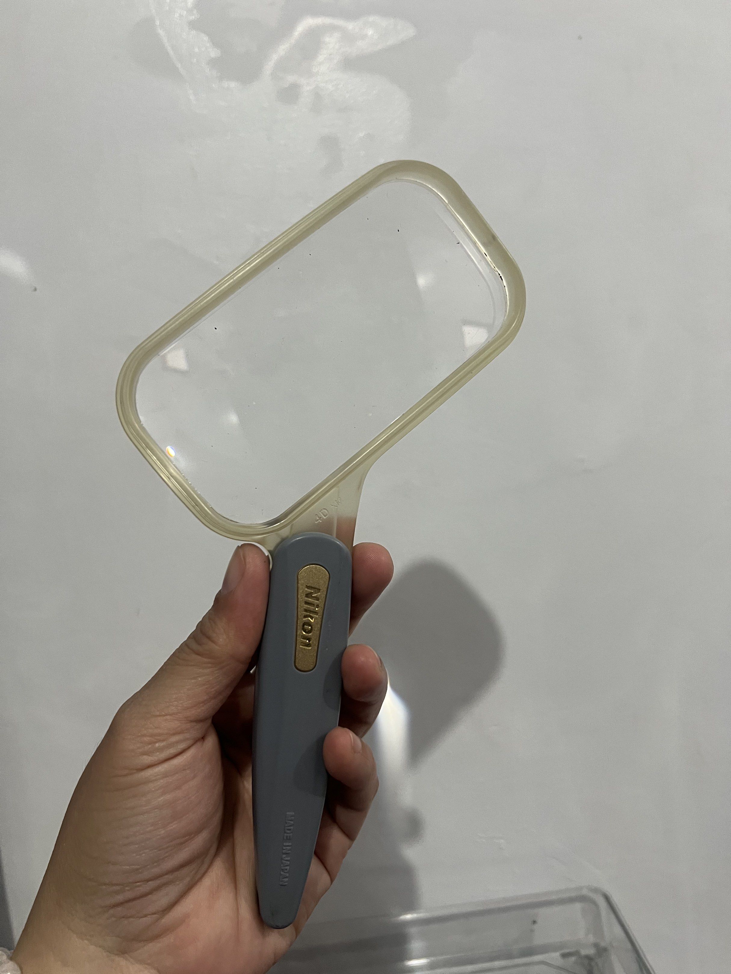 Nikon 4D XM RECTANGULAR LOUPE (Category: Lens & Kits) located in Bacoor. Submitted by faith.hope.love28 (Listing ID 1420572229, Image 1). Description: - Nikon magnifying glass - Gray handle - Clear rectangular lens - Gold Nikon logo - 'MADE IN JAPAN' marking - '4D XM' lens marking.