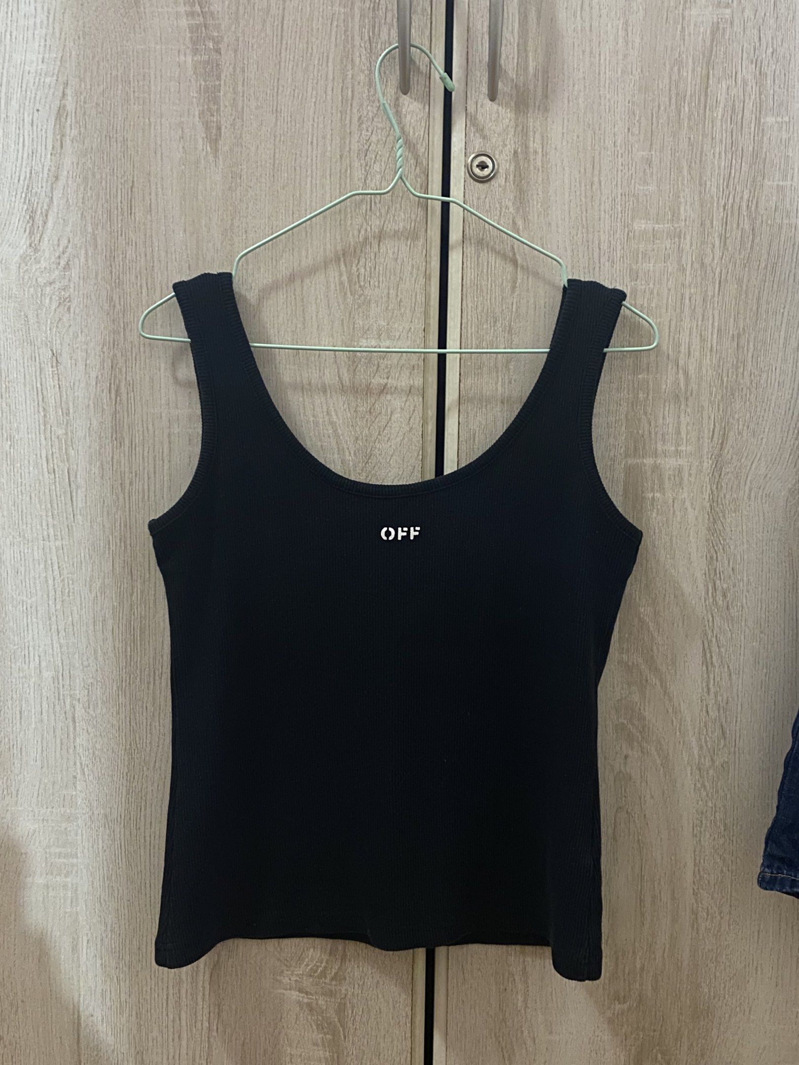 OFF-WHITE Off Stamp ribbed-knit tank top - Size Small (Category: Sleeveless) located in Manila. Submitted by anneeem (Listing ID 1420713055, Image 2). Description: - Not sure if authentic - Size: Small - Color: Black - Material: Ribbed knit.
