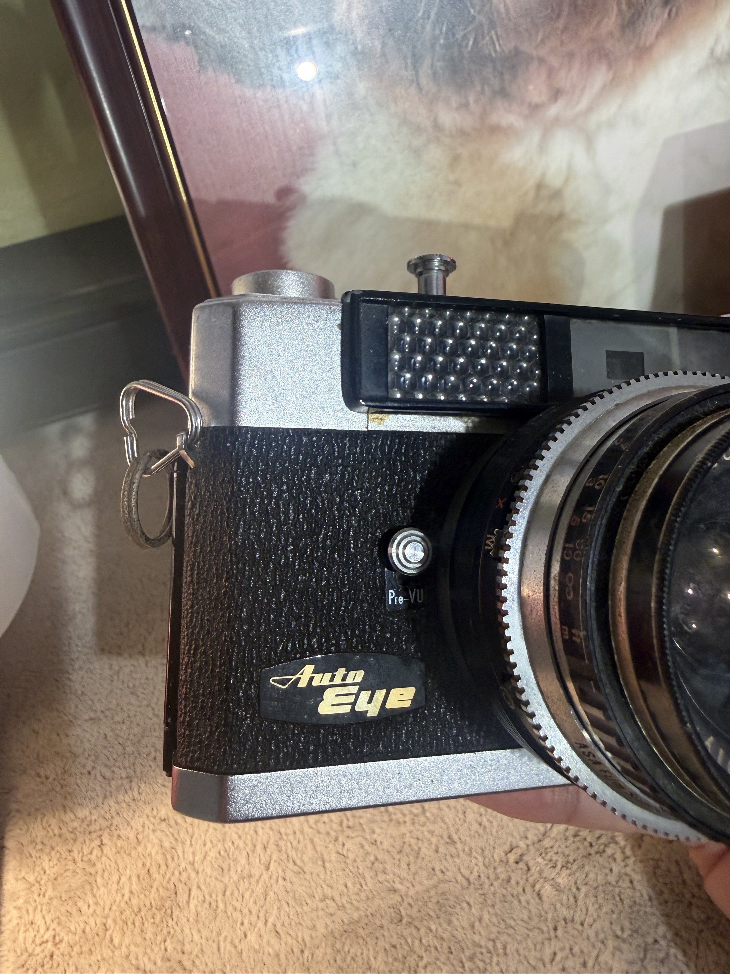 Olympus Auto Eye Camera (Category: Cameras) located in Manila. Submitted by dashanonuevo (Listing ID 1420589804, Image 3). Description: Released in 1960, this was a groundbreaking camera for its time. It was the first Japanese 35mm rangefinder to offer “shutter-priority” automatic exposure, meaning you pick the speed and the camera’s “Electric Eye” handles the rest. - Olympus Auto Eye camera - D.Zuiko 1:2.8 f=4.5cm lens - Includes lens cap - Silv