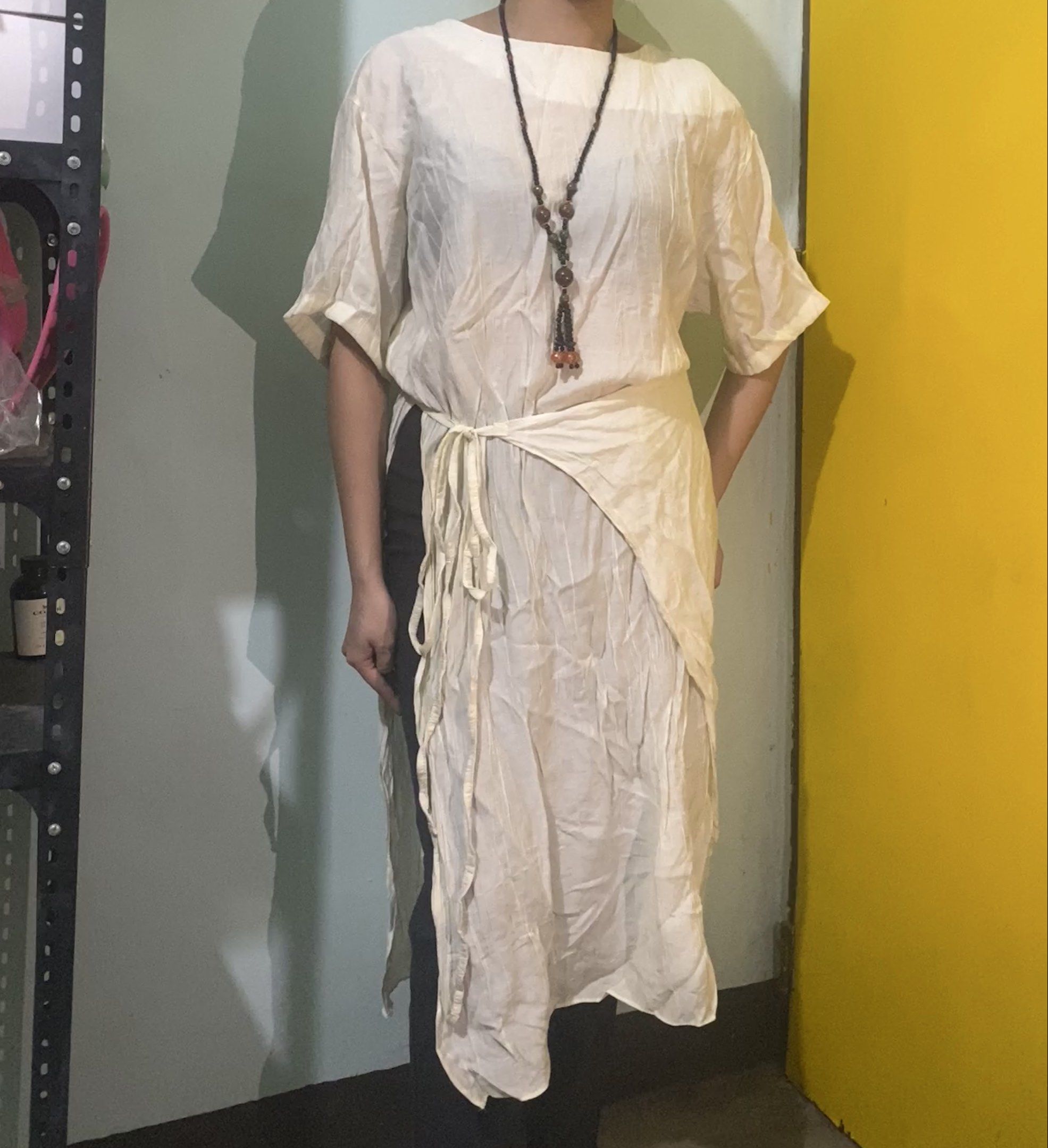 Overlap Dress over jeans with Tie (Category: Dresses) located in Manila. Submitted by orcharchives (Listing ID 1420548586, Image 2). Description: ❤️PLEASE READ Loc: Meycauayan, Bulacan For sure buyer: 1. Please only Make an offer if sure kukunin 2. Send your details for confirmation 3. Payment first gcash only DETAILS - first photo from google for inspo - Cream off white colored wrap dress over jeans - slits sides - Boat neckline - Flowing hem - 
