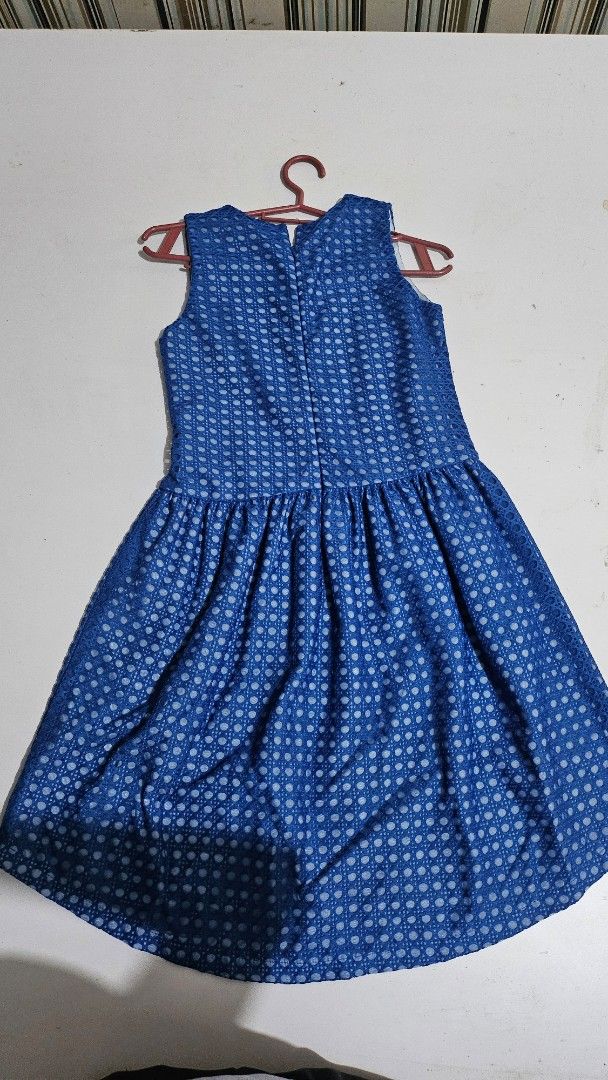 Peppermint Blue Dress Size 14 (Category: Babies & Kids Fashion) located in Manila. Submitted by mikafinds (Listing ID 1420637961, Image 2). Description: - Peppermint blue dress - Size 14 - Sleeveless design - Round neckline - Fitted bodice - Flared skirt - Textured fabric RFS: Outgrown Mode of payment: Gcash Delivery: Shouldered by buyer Mode of Delivery: Lalamove or Grab.