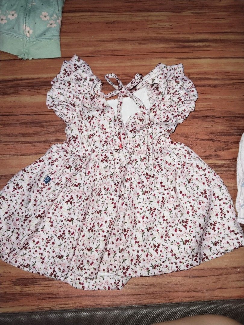 Pink floral dress (Category: Babies & Kids Fashion) located in Quezon City. Submitted by jholouise (Listing ID 1420705834, Image 2). Description: Pink floral dress with inner lining bought in sm used a few times only best fit 6mos can fit up to 1 y.o if petite.