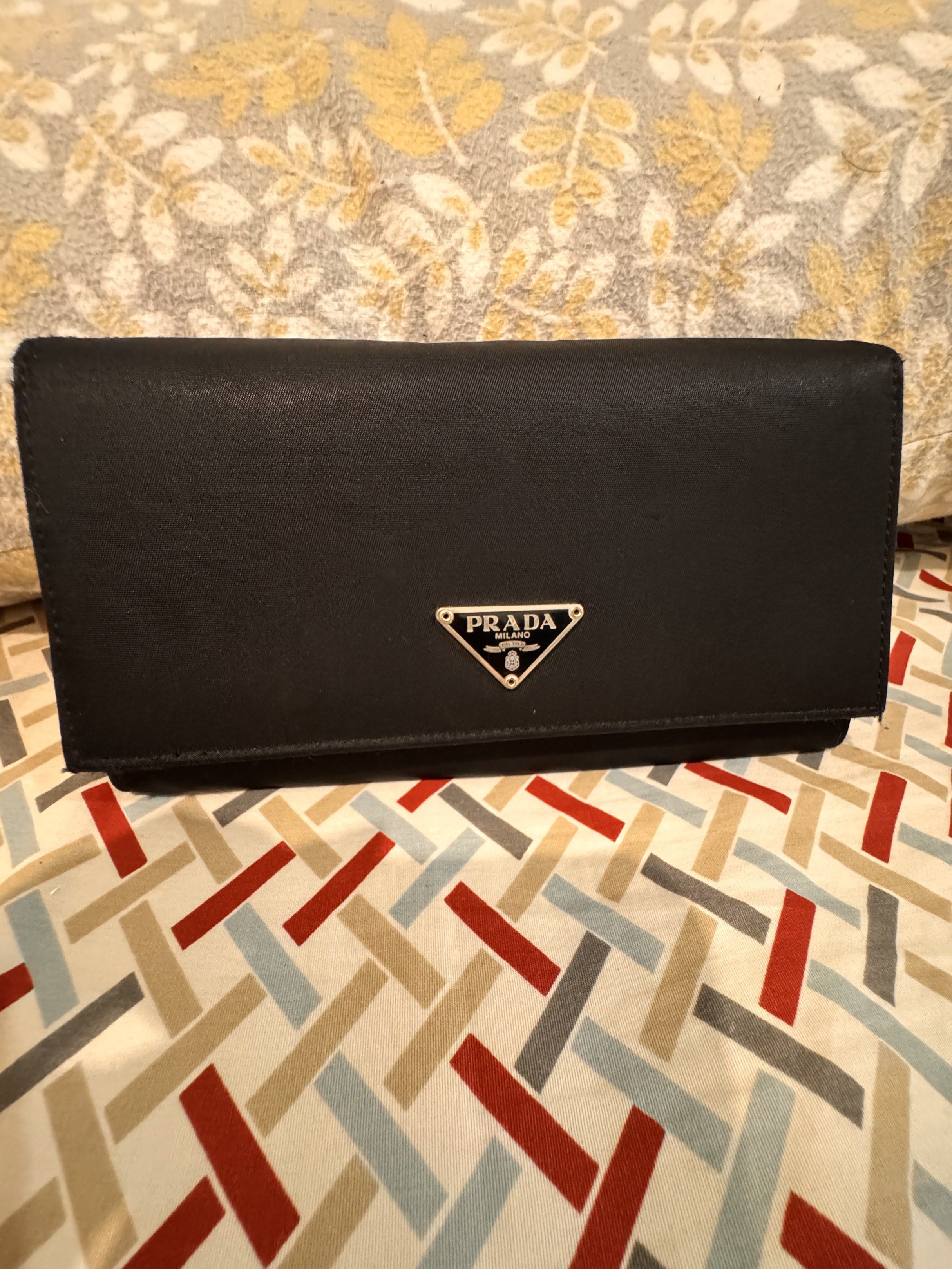 Prada long wallet (Category: Luxury Bags & Wallets) located in Quezon City. Submitted by jmako (Listing ID 1420674636, Image 1). Description: Good condition Authentic 💯 .