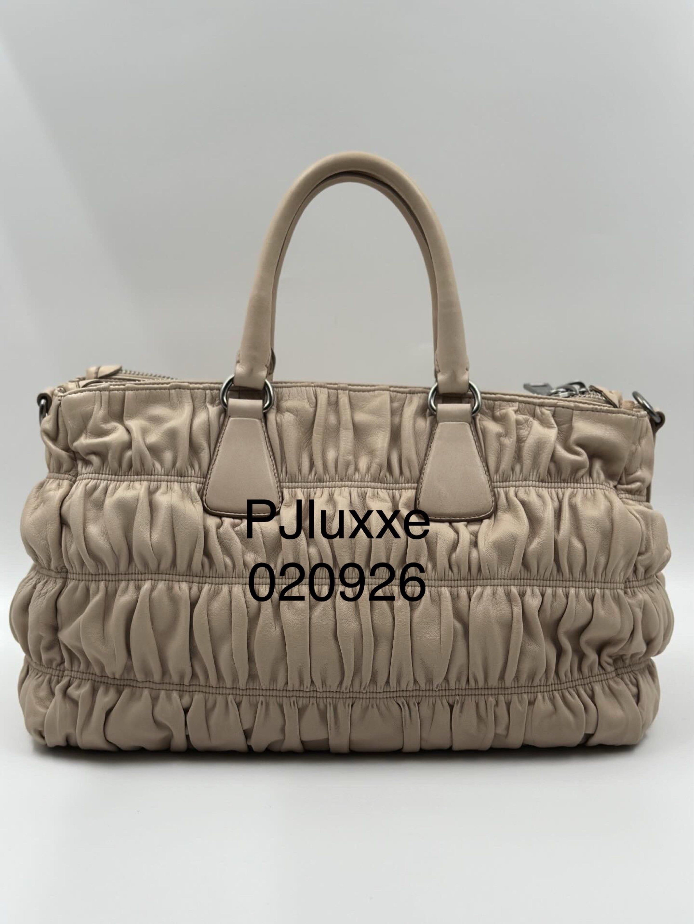 Prada Nappa Gaufre leather two-way bag (Category: Luxury Bags & Wallets) located in Manila. Submitted by pjluxxe (Listing ID 1420705232, Image 2). Description: RFS: Decluttering, barely used. comes with strap, carecard, auth card, tag price, Entrupy cert and dust bag.