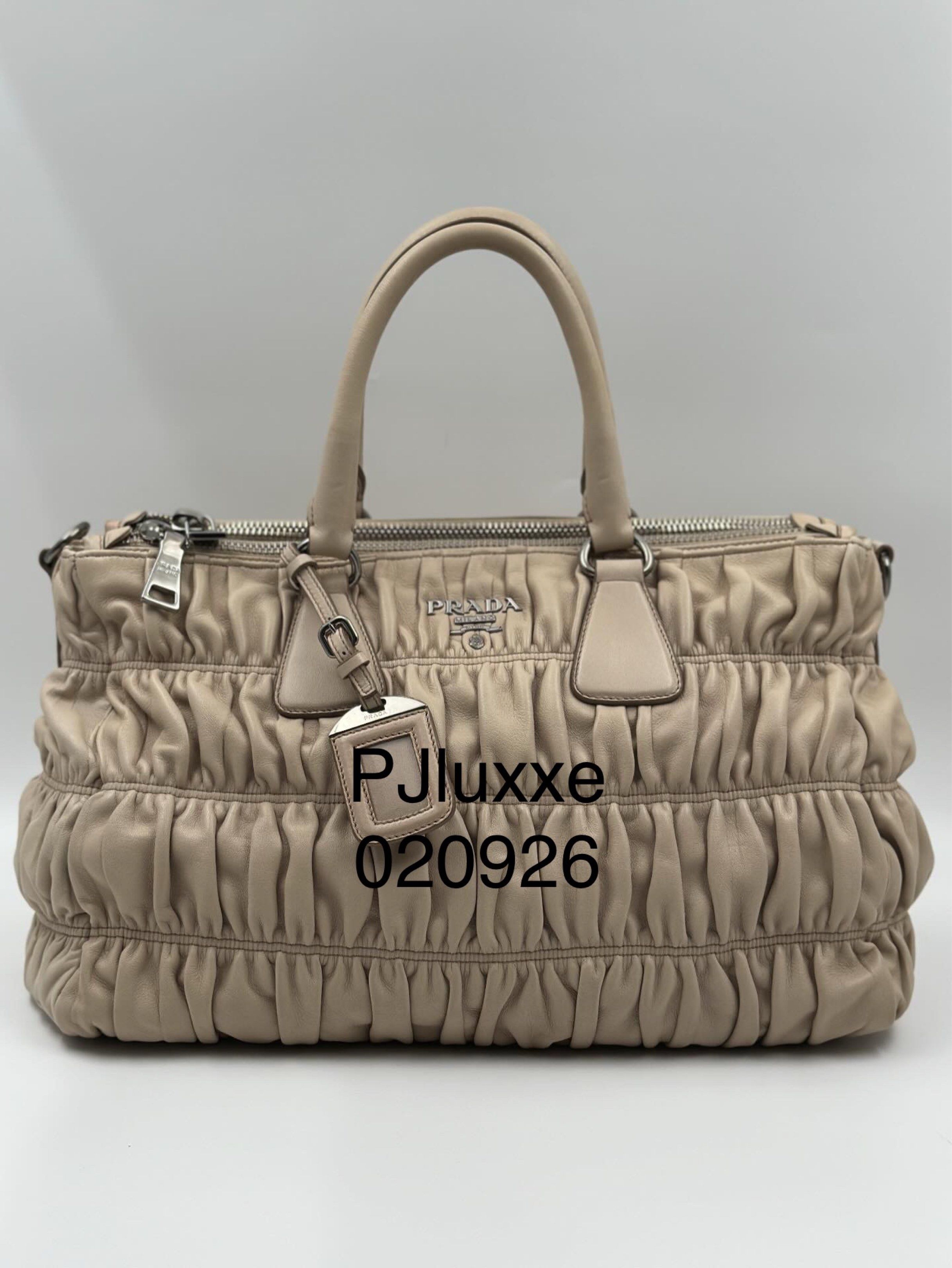Prada Nappa Gaufre leather two-way bag (Category: Luxury Bags & Wallets) located in Manila. Submitted by pjluxxe (Listing ID 1420705232, Image 1). Description: RFS: Decluttering, barely used. comes with strap, carecard, auth card, tag price, Entrupy cert and dust bag.