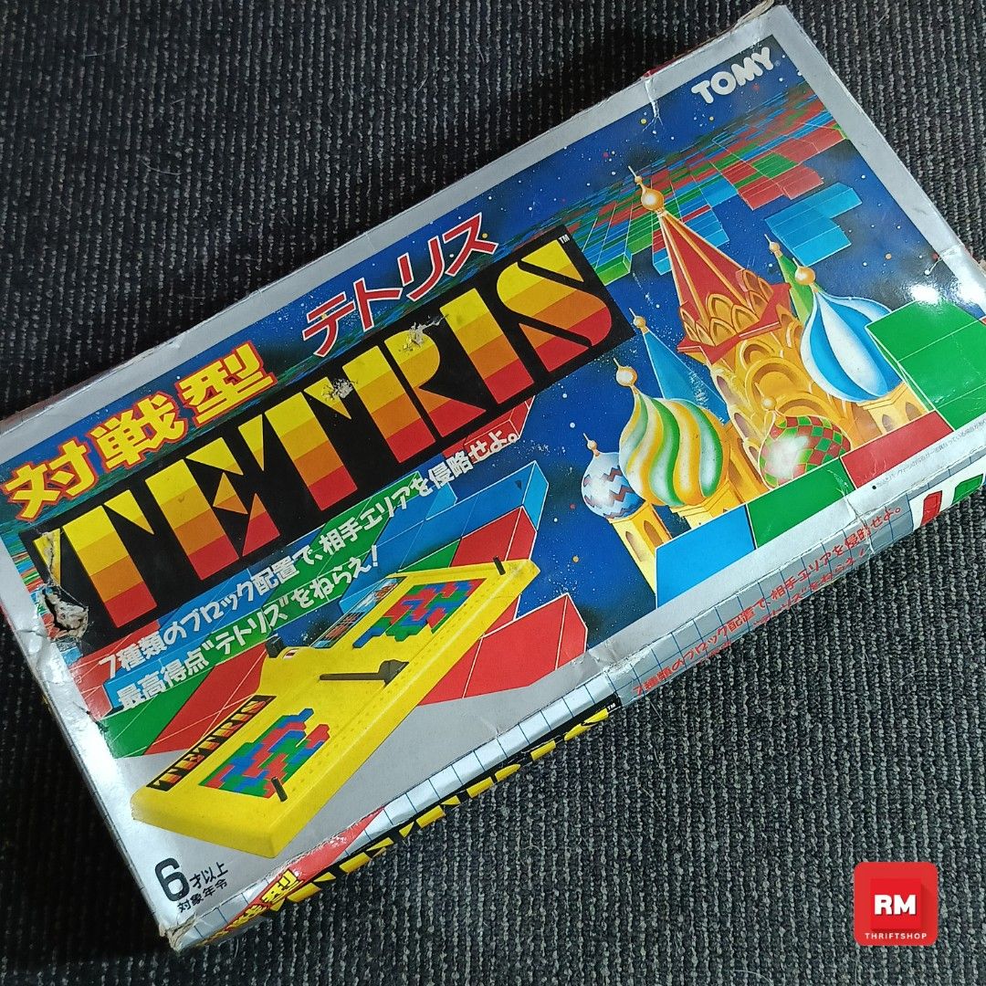 Tomy Tetris Board Game | F1 (Category: Board Games & Puzzles) located in Meycauayan. Submitted by redmants2011 (Listing ID 1420563552, Image 2). Description: as is missing divider piece new old stock Fixed Price Flash Express.