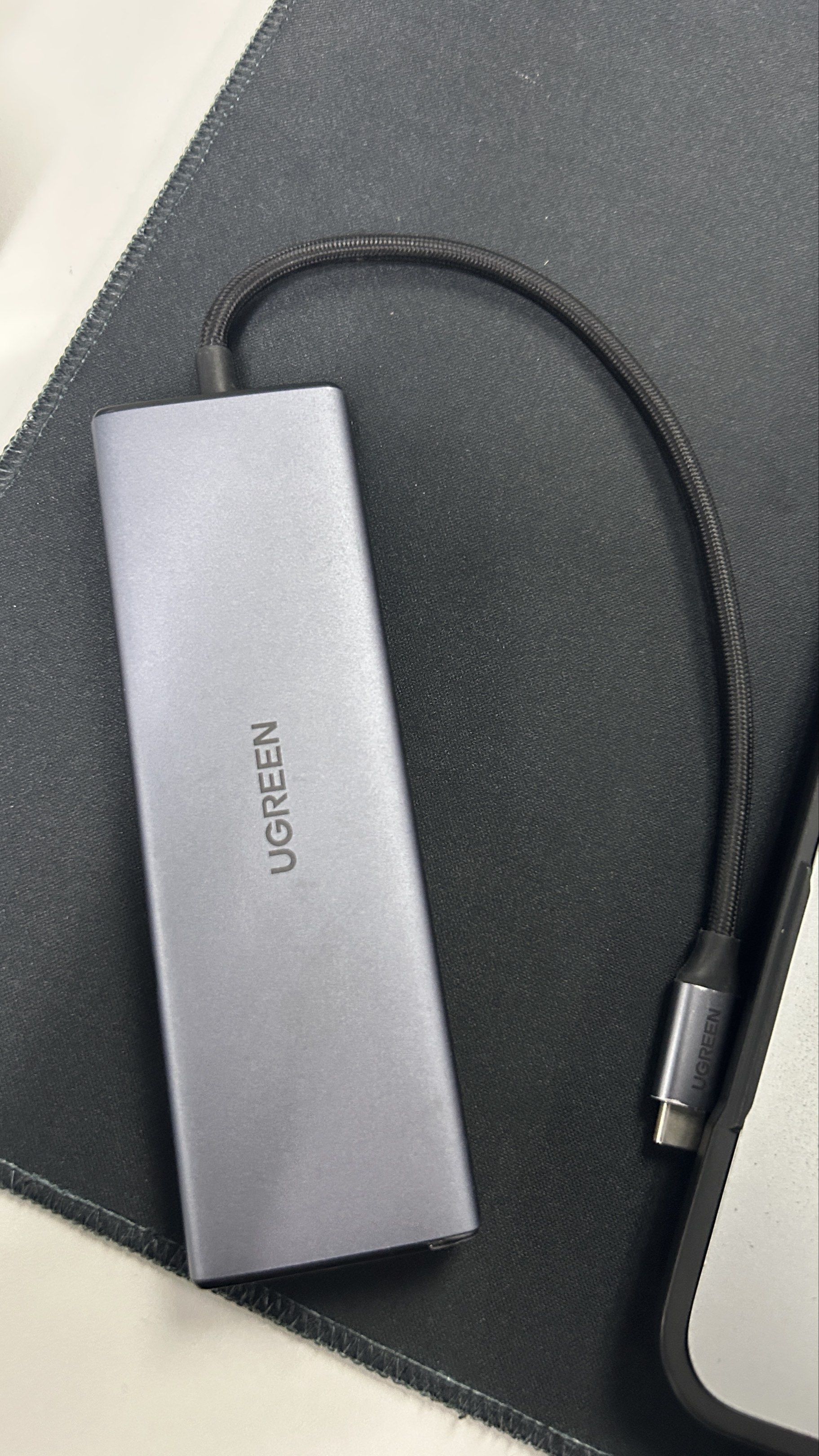 UGREEN USB-C Hub (Category: Cables & Adaptors) located in Makati City. Submitted by mrmagic.ph8888 (Listing ID 1420567987, Image 1). Description: - UGREEN USB-C Hub for expanded connectivity. - Ports: HDMI, Ethernet, VGA, USB, and Audio Jack. - Sleek gray design. - USB-C connector for easy connection. - Perfect for connecting multiple devices to your laptop or tablet..