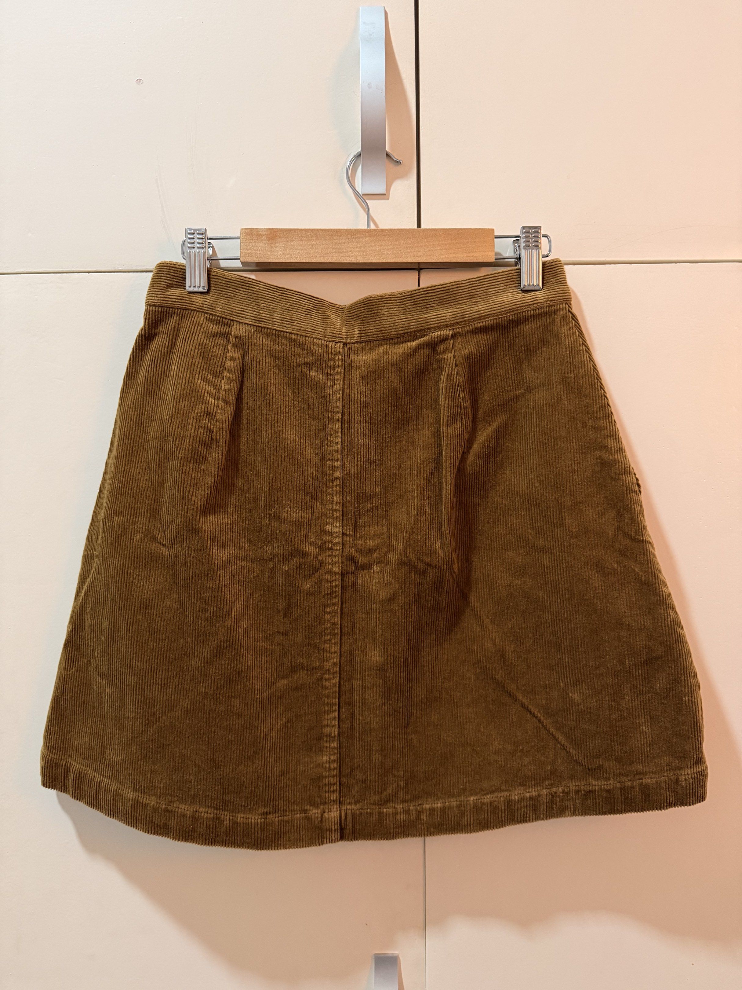 Uniqlo Corduroy Button-Down Skirt (Category: Skirts) located in Cabanatuan. Submitted by geleen.declutter (Listing ID 1420654353, Image 2). Description: - Uniqlo corduroy skirt - Classic A-line silhouette - Button-down design - Color: Brown - Two front pockets See photos for size and fitting No issues, only worn once on new year's.