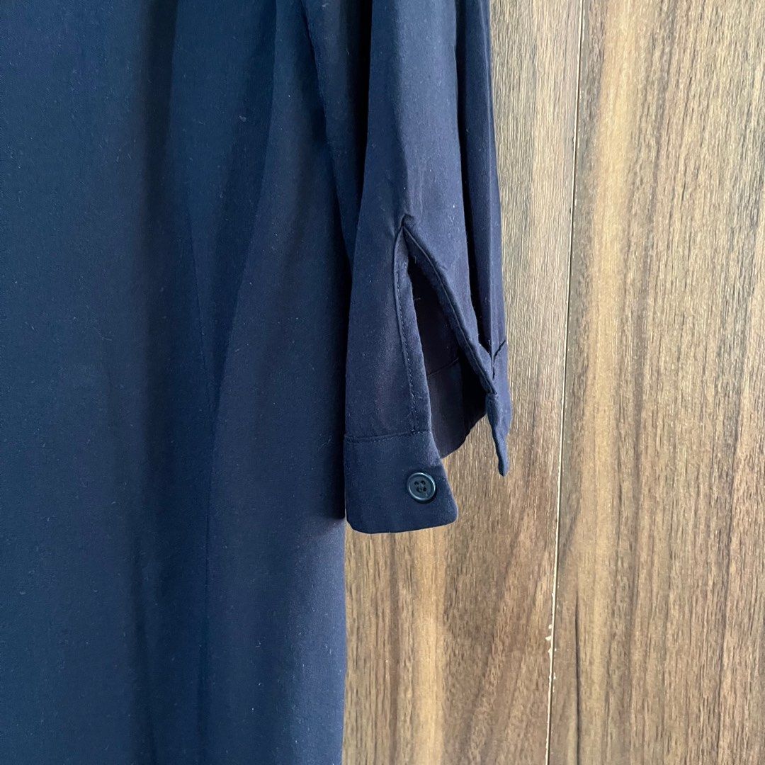 Uniqlo Rayon Navy blue Top (Category: Blouses) located in Angeles City. Submitted by mdxnix (Listing ID 1420592418, Image 3). Description: - S on tag - 8.5/10 condition - The color of the item may vary slightly due to photographic lighting - Strictly no return/ no exchange - I am no longer liable once the item has been shipped out to the courier - Sf will be shouldered by the buyer - Mode of Payment: Gcash/ Maya - Mode of Delivery: J&T (if possib