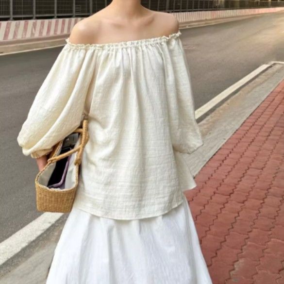 Wool Grain Linen Puff Yellow Off-Shoulder Blouse (Category: Longsleeves) located in Manila. Submitted by mikafinds (Listing ID 1420640592, Image 2). Description: bought from somsstorefy.ph - Bona Top - other cuff is more loose than the other but not noticeable RFS: I don't see myself wearing it now Mode of payment: Gcash Delivery: Shouldered by buyer Mode of Delivery: Lalamove or Grab.