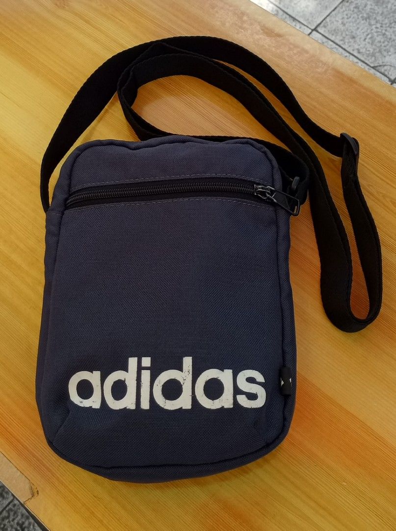 ADIDAS LINEAR ORGANIZER CROSSBODY BAG BLUE (Category: Sling Bags) located in Marikina City. Submitted by windeq15 (Listing ID 1424044822, Image 1). Description: 300 + Shipping fee ADIDAS LINEAR IN CROSSBODY BAG BLUE IN COLOR MEASUREMENTS: 5 cm x 15 cm x 21 cm MADE IN INDONESIA MOP: GCash..Cash on Meet-up NO GCASH KKB TRANSACTION PAYMENT FIRST!!! PAYMENT FIRST!!! Shipping Fee on buyer's expense NO RESERVE. LBC, Lalamove, Grab, JNT Purchase item AS