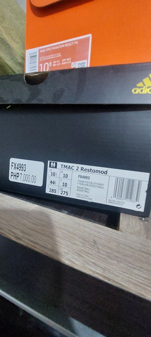 Adidas TMAC 2 Restomod FX4993 (Category: Sneakers) located in Pasig City. Submitted by joyc04497 (Listing ID 1424067818, Image 2). Description: - Adidas TMAC 2 Restomod - Color: White with blue accents - Size: US 10 / UK 10 / EUR 44 - Model: FX4993 - Original Price: PHP 7000.00.