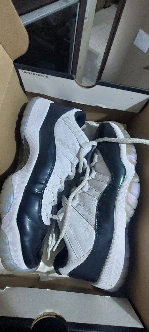 Air Jordan 11 Low Concord (Category: Sneakers) located in Pasig City. Submitted by joyc04497 (Listing ID 1424068011, Image 1). Description: - Air Jordan 11 Low Concord - White upper - Black patent leather - Translucent outsole - Includes original box.