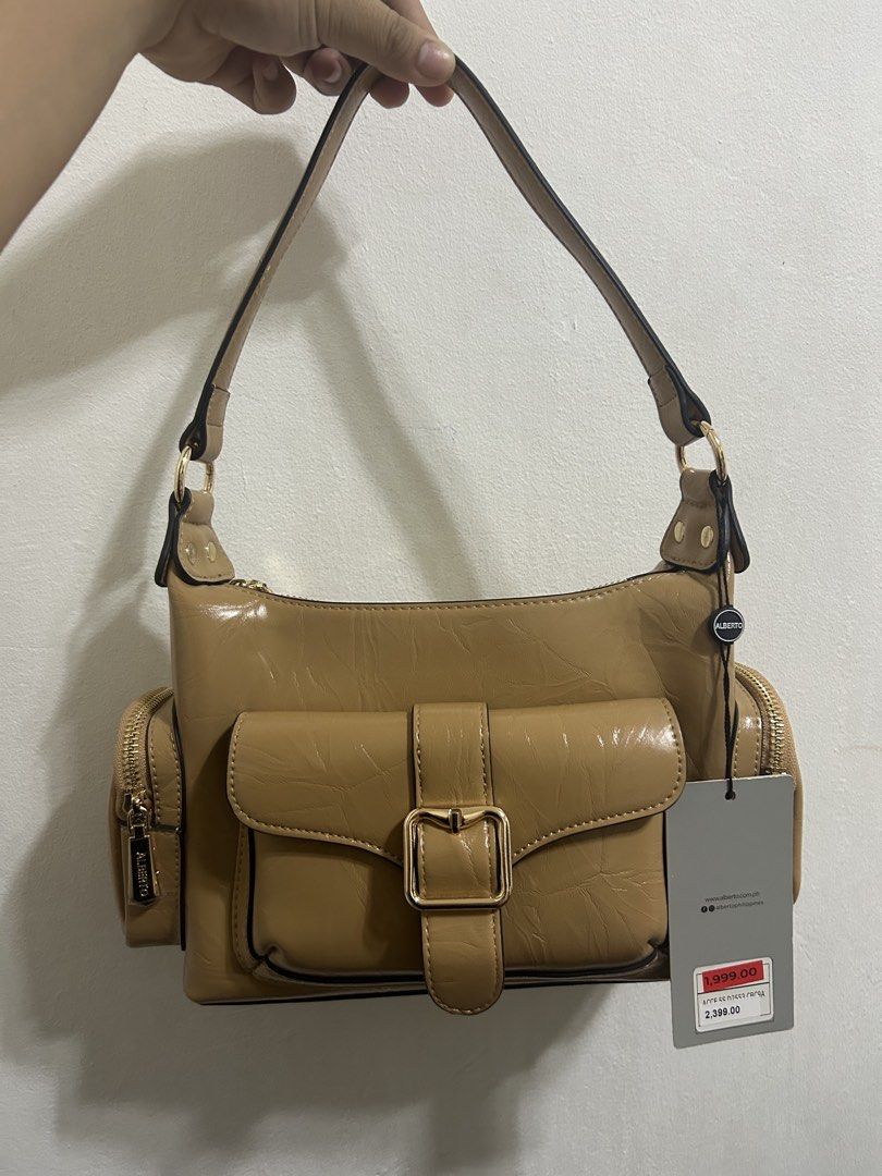 Alberto Caroline Mini Handbag - Nude (Category: Luxury Bags & Wallets) located in Caloocan City. Submitted by bbtorres2023 (Listing ID 1424122675, Image 1). Description: Brand New & Original Caroline Mini Nude Color ORIGINAL Alberto, not dupe or Class A Design po yung crease lines, hindi po yan damage Bought from sale, but never used.