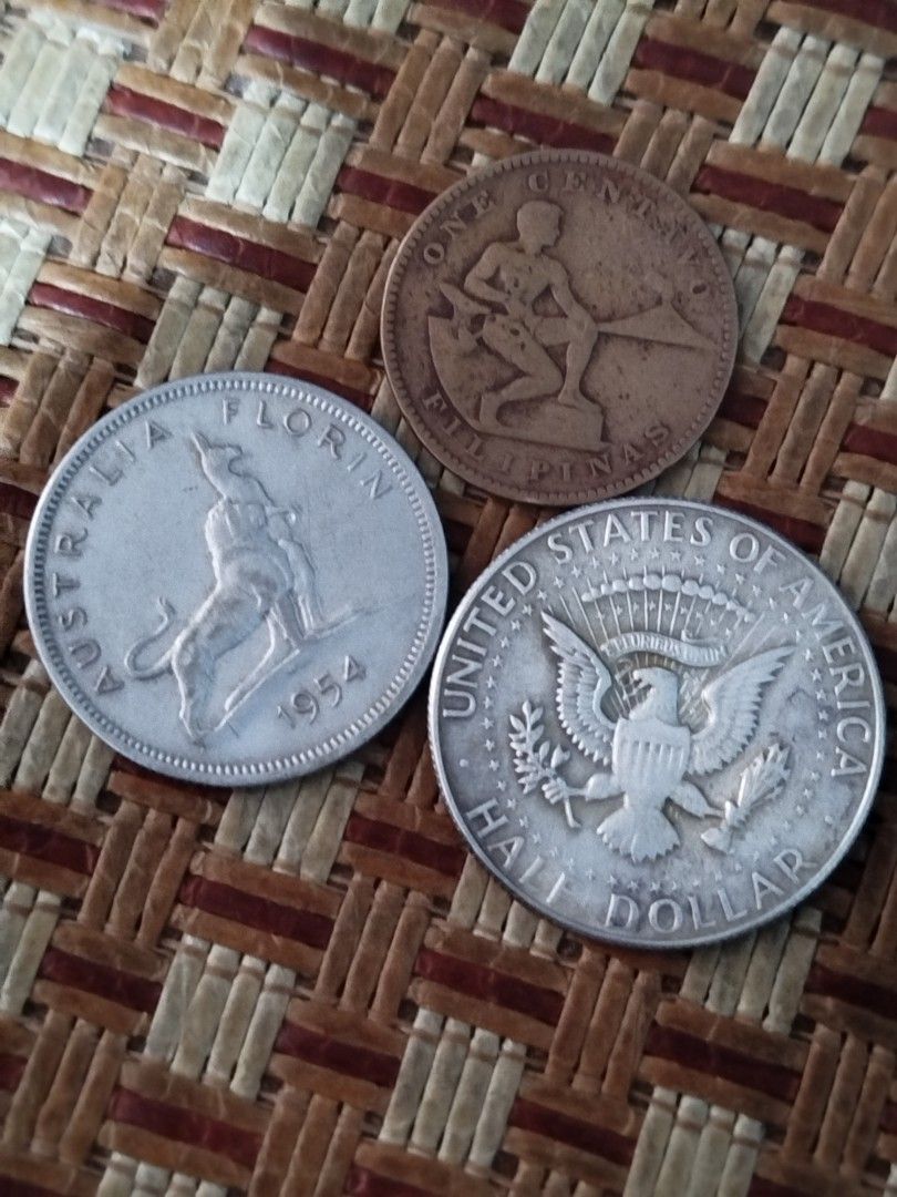 Assorted Vintage Coins (Category: Currency) located in Subic. Submitted by regiedaniel01 (Listing ID 1423973582, Image 2). Description: - Collection of vintage coins - Includes: 1904 US coin, 1968 US half dollar, 1954 Australian Florin, and others - Features various designs and inscriptions - Made of different metals - Perfect for coin collectors!.