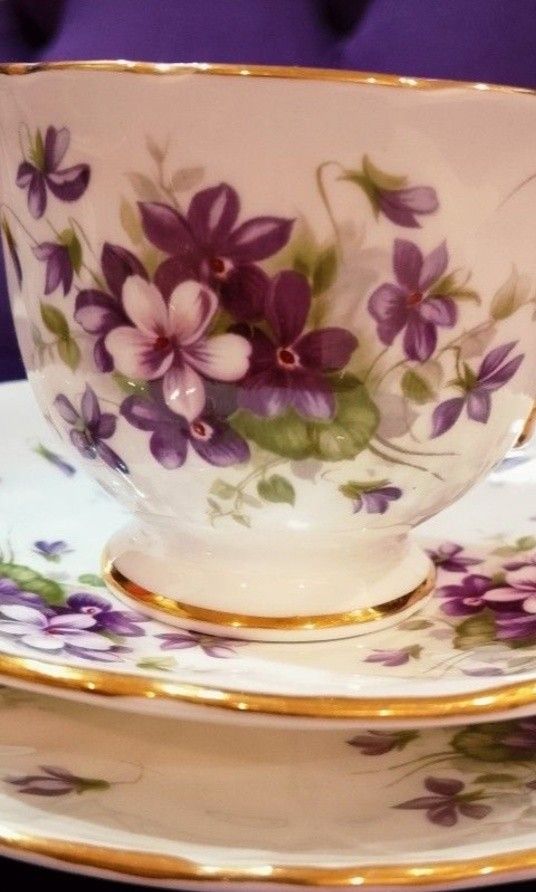 Aynsley Violette Floral Tea Cup Set (Category: Coffee & Tea Tableware) located in Cabanatuan. Submitted by miss.maia (Listing ID 1421775304, Image 3). Description: -Brand: Aynsley. Pattern: Violette, -featuring purple violets and gold trim. -Material: Fine bone china. -Origin: Made in the United Kingdom - Vintage teacup set - Purple floral design with gold trim - Includes cups, saucers, and side plates - Perfect for serving tea or display -1580 p