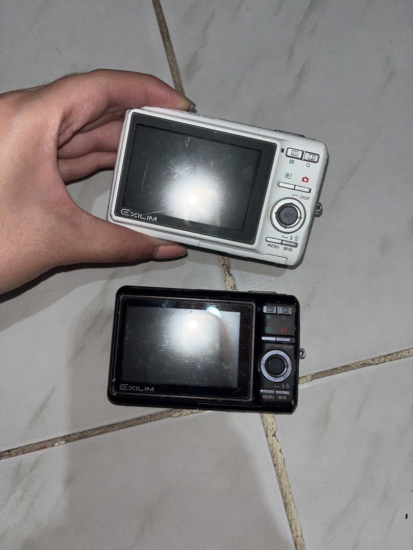 B1T1 Casio Exilim Digital Camera (Category: Cameras) located in Manila. Submitted by sabrinaser22401 (Listing ID 1424107519, Image 2). Description: Casio Exilim Digital Cameras (white and black) - 7.2 Megapixel Resolution - 2.8k for both cams (nego for sure buyers) - Inclusions: Cameras only, no battery - Chat for sample shots White Casio Exilim - Personal camera - Sira sensor, pero goods pa rin using flash - good body condition Black Casio Exili