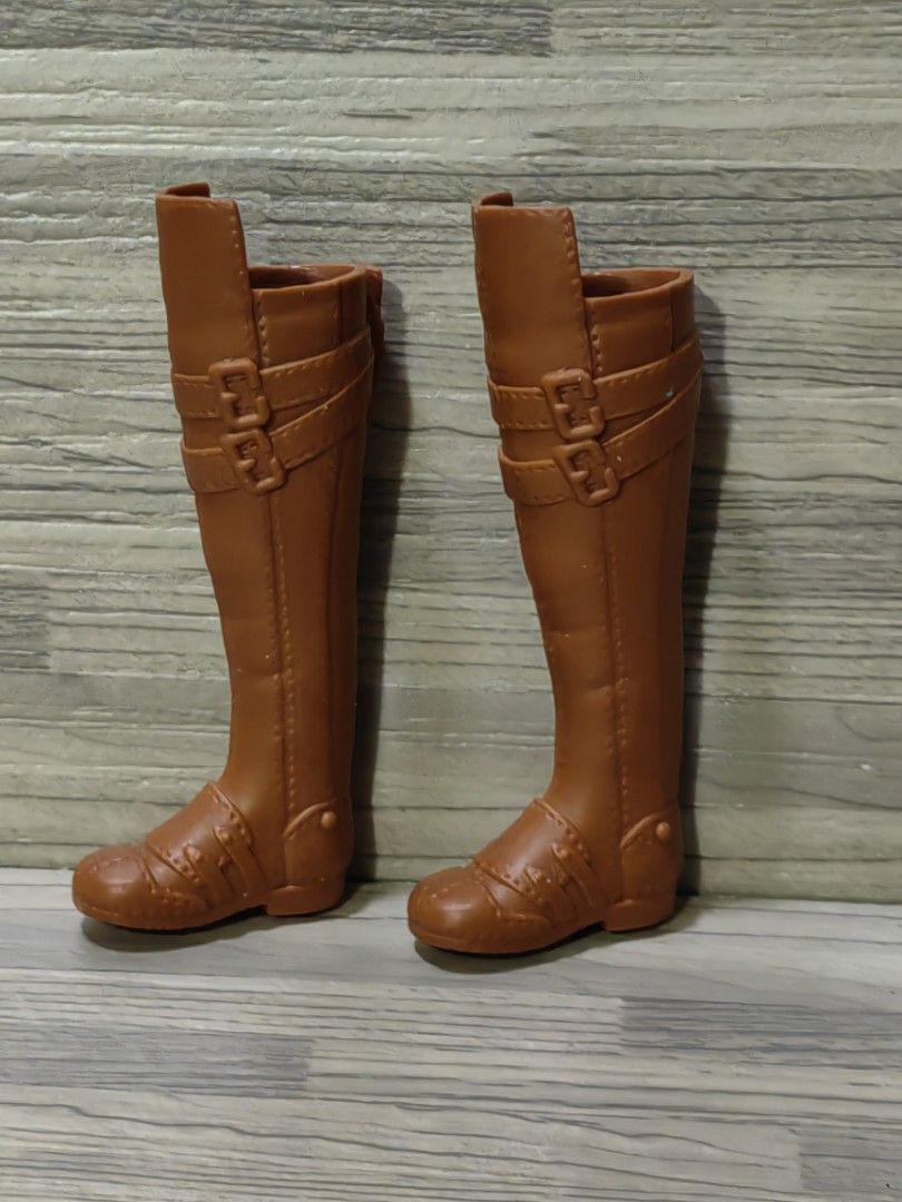 Barbie boots (for petite) (Category: Boots) located in Quezon City. Submitted by silverturtle_32df92 (Listing ID 1423984280, Image 1). Description: Barbie knee high boots all original Mattel from a Barbie Fashionista doll for petite doll only as is, actual photos owned by adult collector shipping via j&t or lalamove shouldered by buyer dm for inquiries location: QC .