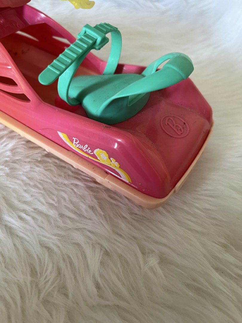 Barbie Camping fun Jet Ski 2016 (Category: Toys & Games) located in Hermosa. Submitted by hollimolly_ (Listing ID 1423985537, Image 3). Description: - Barbie Jet Ski toy - Pink and green color scheme with yellow accents - Includes seat and handlebars - Features the Barbie logo - Great for kids who love Barbie and water play.