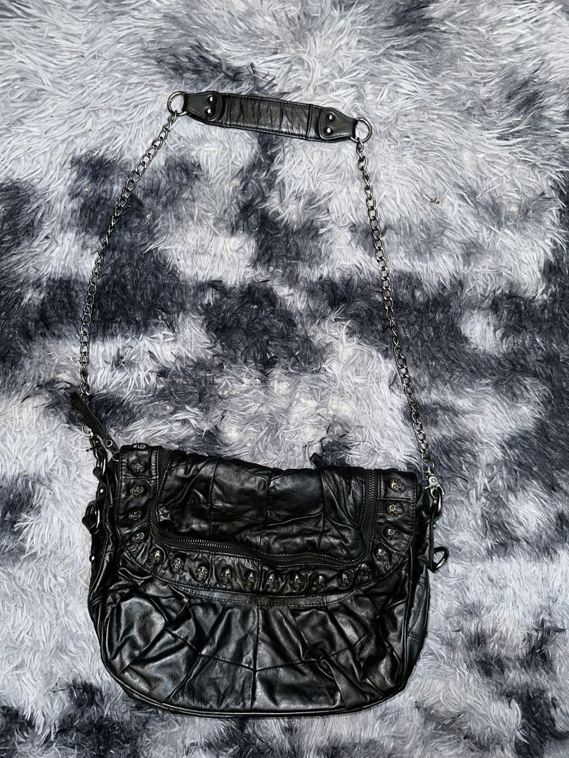 Black Leather Skull Shoulder Bag with Chain Strap (Category: Shoulder Bags) located in Puerto Princesa. Submitted by 22B_Garments (Listing ID 1424150006, Image 1). Description: - Black leather shoulder bag - Silver-toned chain strap - Flap closure with skull-shaped studs - Includes top handle - Interior zipper pocket - Textured, ruched design Y2K Grunge Punk Japanese Archive.