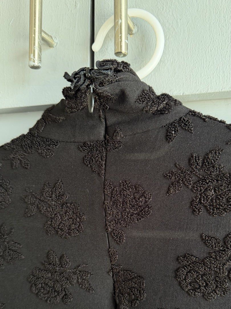 Black Mock Neck Sheer Textured Longsleeve Top (Category: Sleeveless) located in San Juan City. Submitted by itemsfromkam (Listing ID 1423987631, Image 3). Description: • best fits XS - S • sheer/mesh, textured floral pattern, fitted, back zipper closure • good for night outs • actual ww at the end.