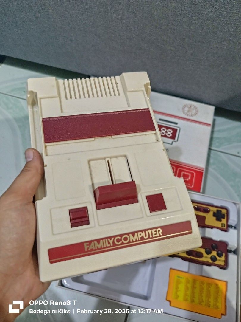 Bootleg Family Computer (Category: Others) located in Cavite. Submitted by bodega_ni_kiks11 (Listing ID 1424147560, Image 3). Description: Bootleg Family Computer with box Untested/as is Good For Display with two controller, cartridge and adaptor.