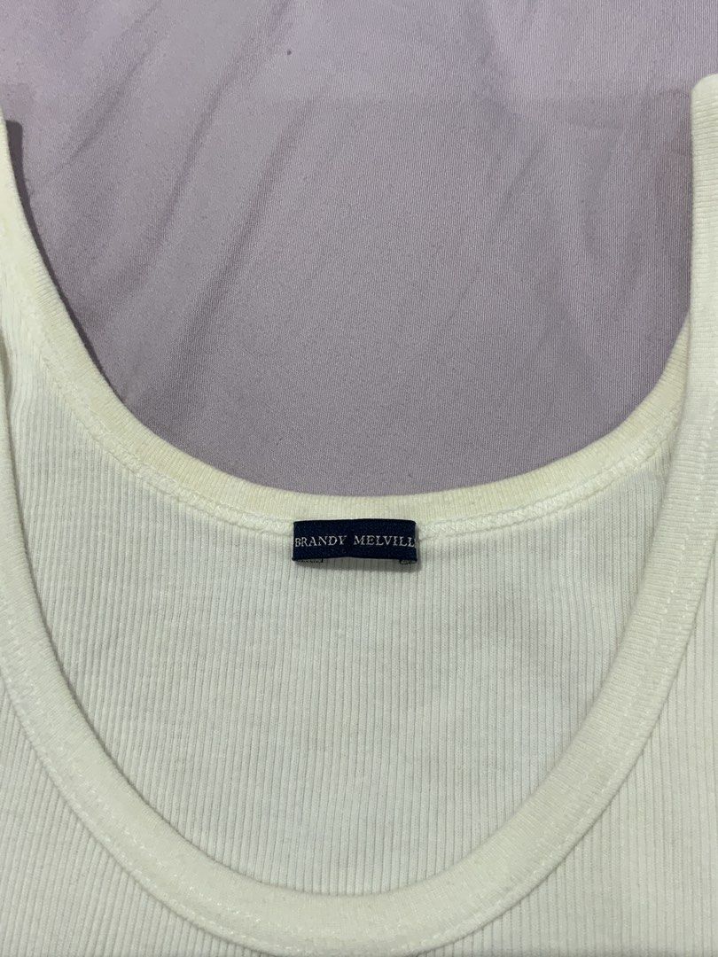 Brandy Melville Butterfly Tank Top (Category: Sleeveless) located in Quezon City. Submitted by ak3isha (Listing ID 1424074043, Image 2). Description: - Never Worn - Ribbed texture - Butterfly patch - Scoop neckline - Sleeveless.