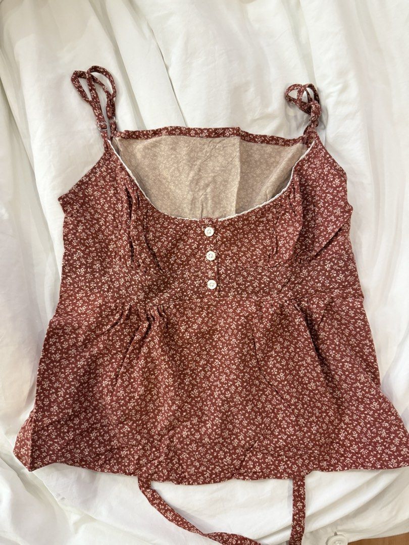 brandy melville inspired tiffany top (Category: Others Tops) located in Marikina City. Submitted by looweesah (Listing ID 1424127480, Image 1). Description: like new! inspired only rfs: not my style anymore mop: gcash/bank transfer .