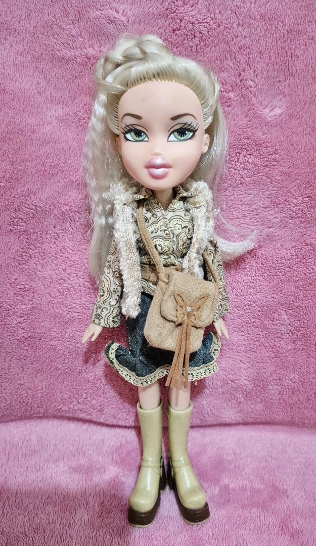 Bratz Doll (Category: Kids Toys) located in Las Pinas. Submitted by peacock.treasures (Listing ID 1424066718, Image 1). Description: - - 2001 BRATZ DOLL from Mattel - Like New - Never Played. Used for PICTORIAL PURPOSES only - with Accessories: Brush & Bag not on the list - Outfit: Vintage Longsleeves with Challeco, Denim Skirt, and Brown Boots.