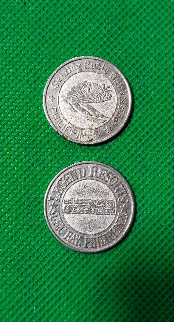 Casino Gaming Tokens (Category: Currency) located in Manila. Submitted by wildcrystal.3b537c (Listing ID 1423973493, Image 1). Description: - Set of casino gaming tokens. - Features tokens from: - Century Subic Bay Philippines - Grand Resort Subic Bay Philippines - Includes tokens marked: - "Casino Gaming Token" - "Not Legal Tender".