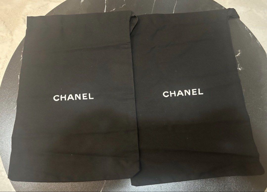 CLEARANCE: Chanel Dustbags (Category: Luxury Accessories) located in Manila. Submitted by luxurybrandsonly (Listing ID 1424003262, Image 2). Description: - Authentic Chanel accessories - Includes: - Two black dust bags (1 pair) - Perfect for storing Chanel items - Great for Chanel collectors.