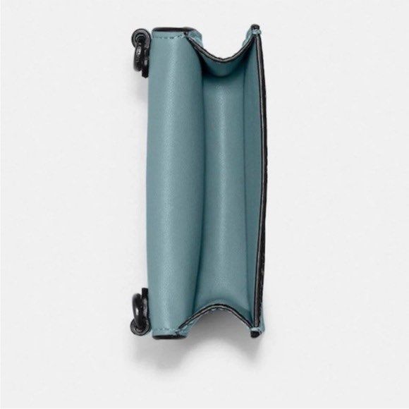 Coach Mini Wallet on Chain Crossbody Bag (Category: Cross-body Bags) located in Makati City. Submitted by cee_store (Listing ID 1424054753, Image 2). Description: Half Flap Card Case Adorable half flap card case in this gorgeous faded blue color from Coach. This is a great accessory that can be worn crossbody or used as a wallet inside your bags!!! It is long sold out, so get it here now before it’s gone!!! Product Details: - Polished pebbled lea